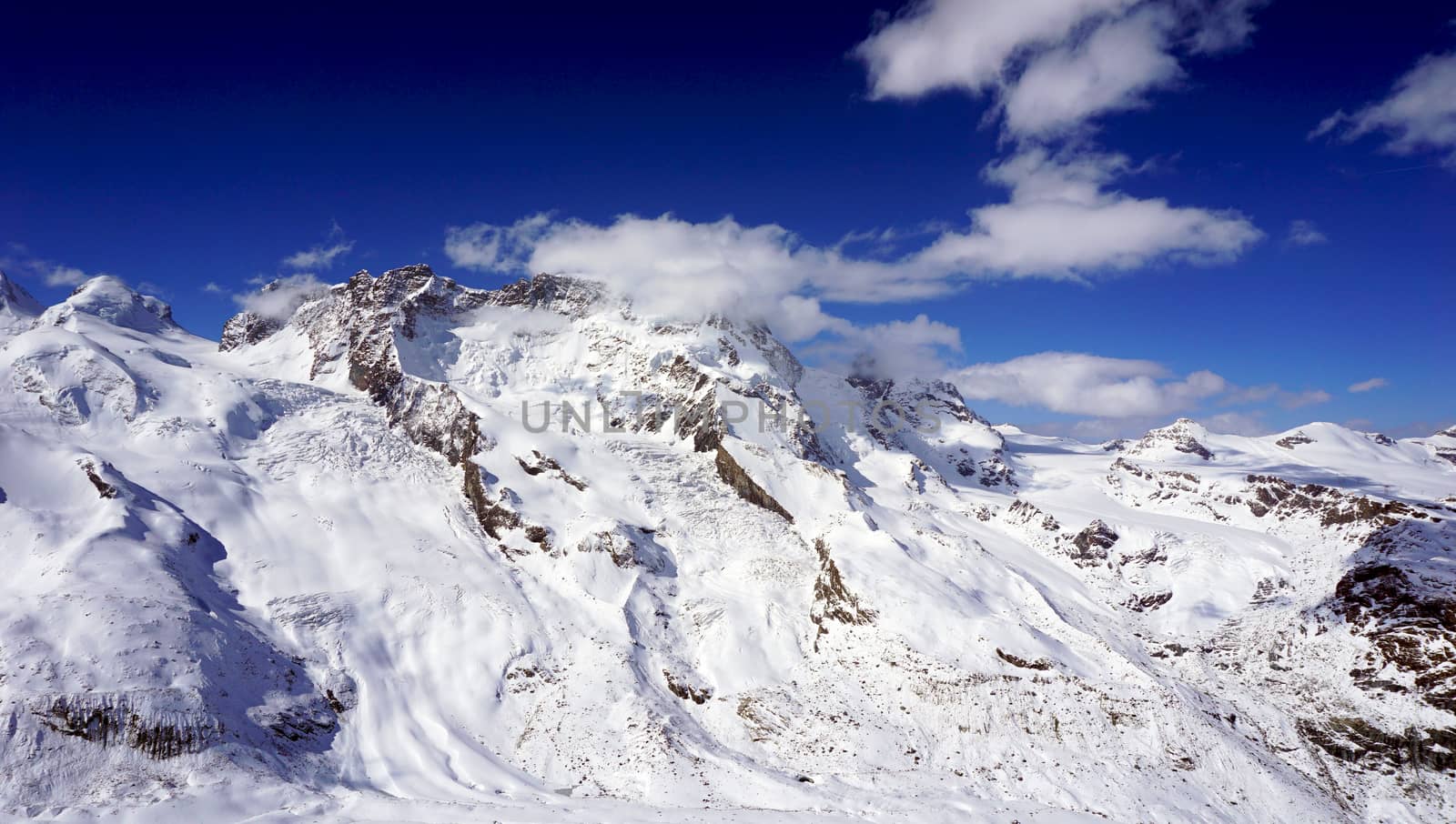 snow alps mountains scene and blue sky, zermatt, switzerland