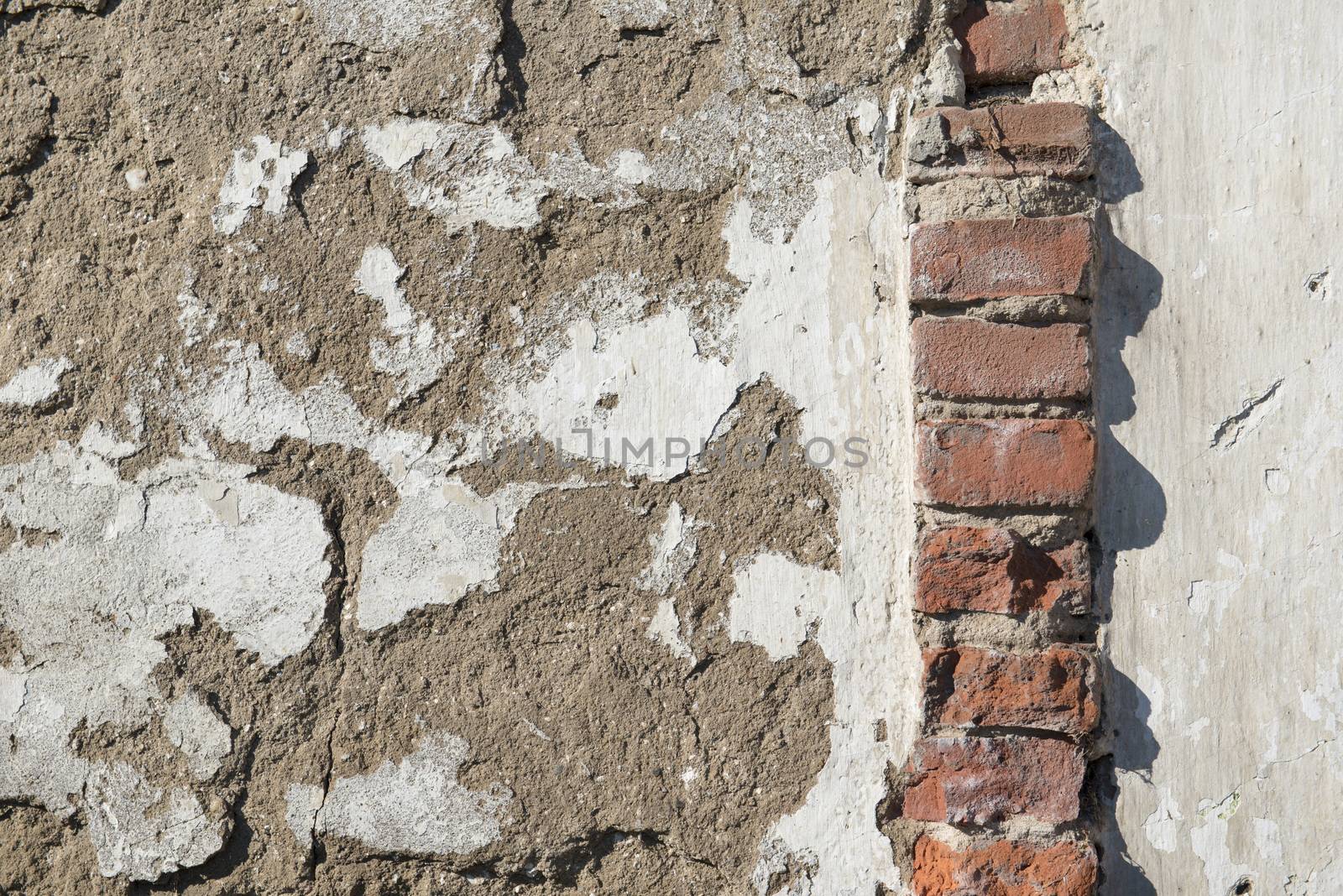 Background, old masonry brick wall in Winterswijk in the Netherlands
