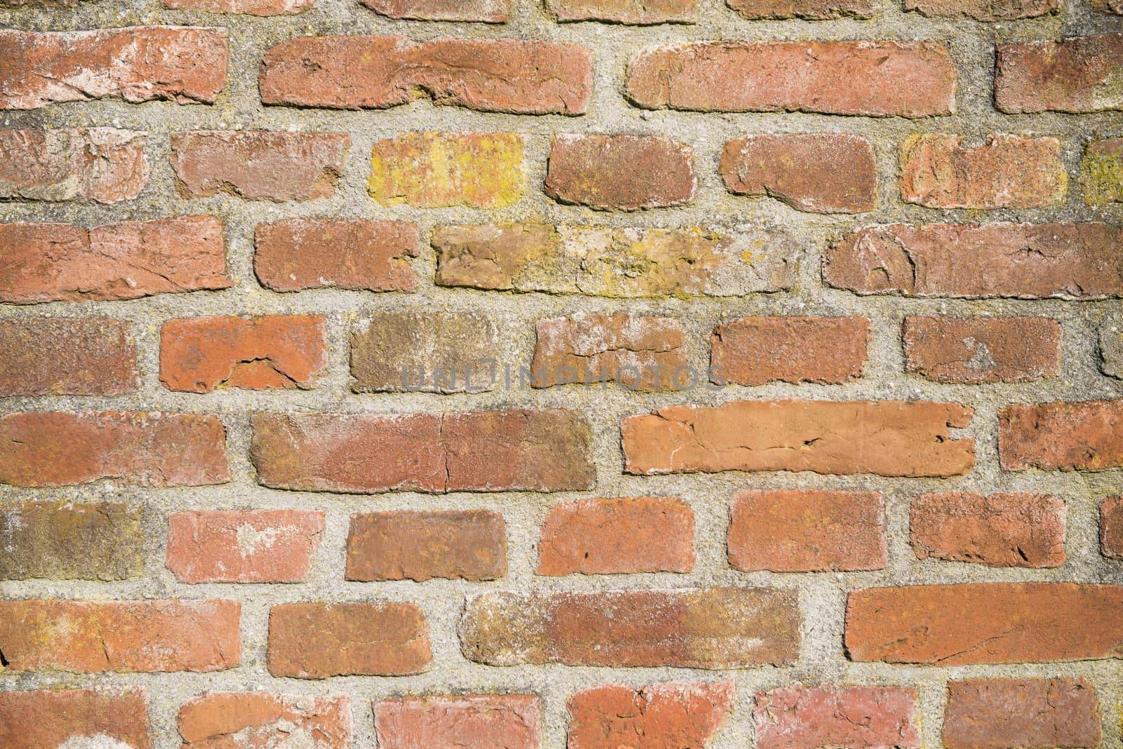 Background, old masonry brick wall in Winterswijk in the Netherlands
