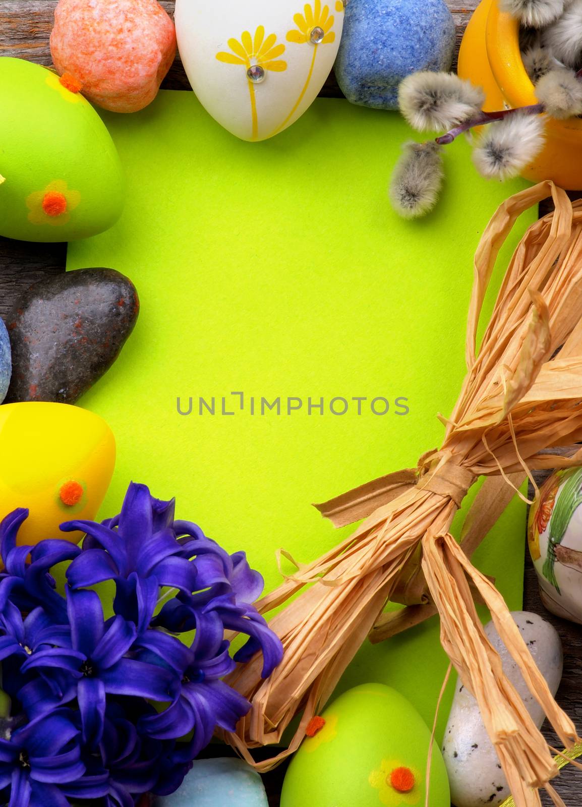 Easter Greeting Card with Pussy-Willow, Colored Stones, Crocus, Easter Eggs and Empty Green Place to Congratulations