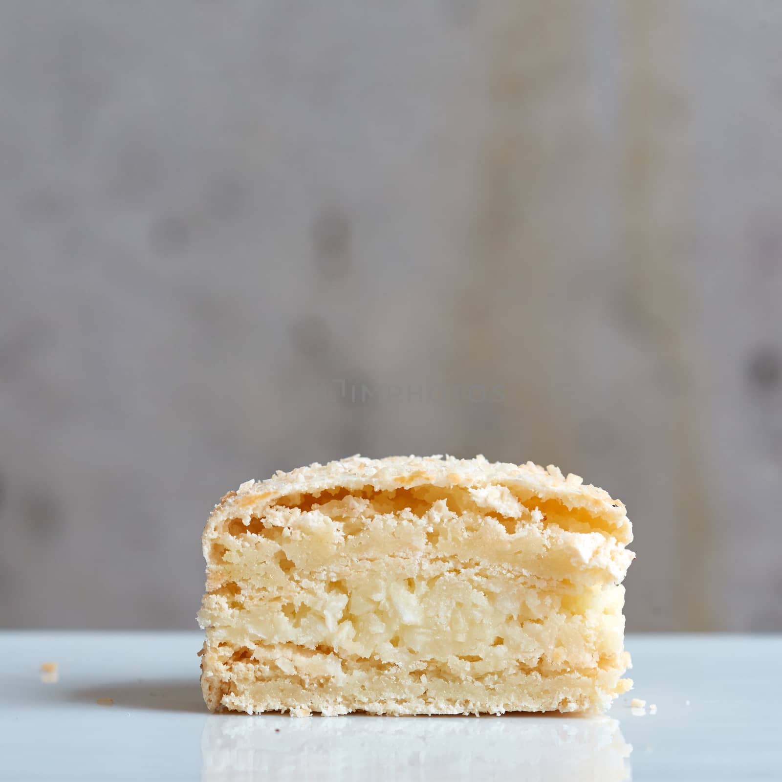 Sweet handmade macaroon on grey background. Shallow dof