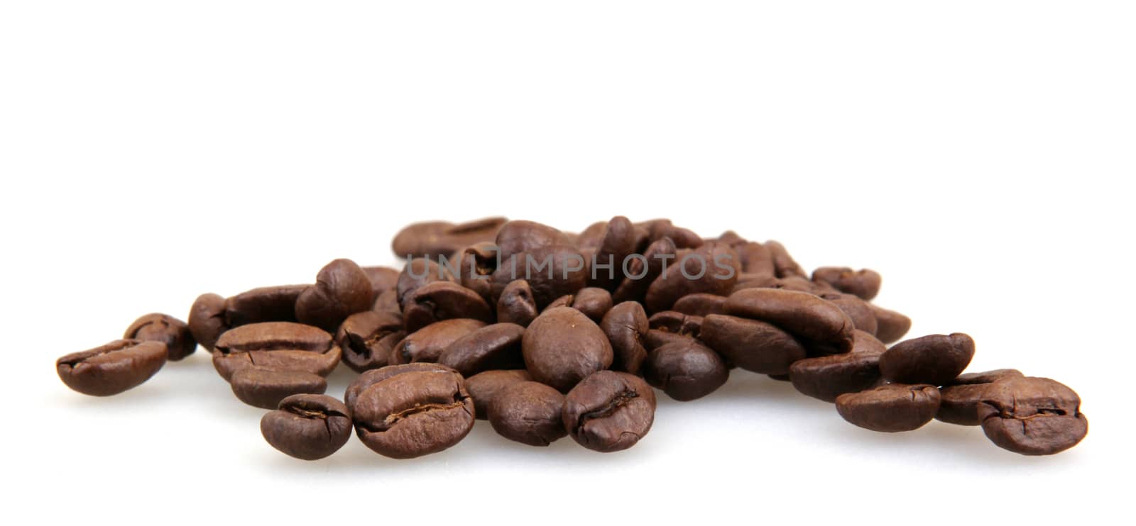 coffee beans isolated on white by nenov