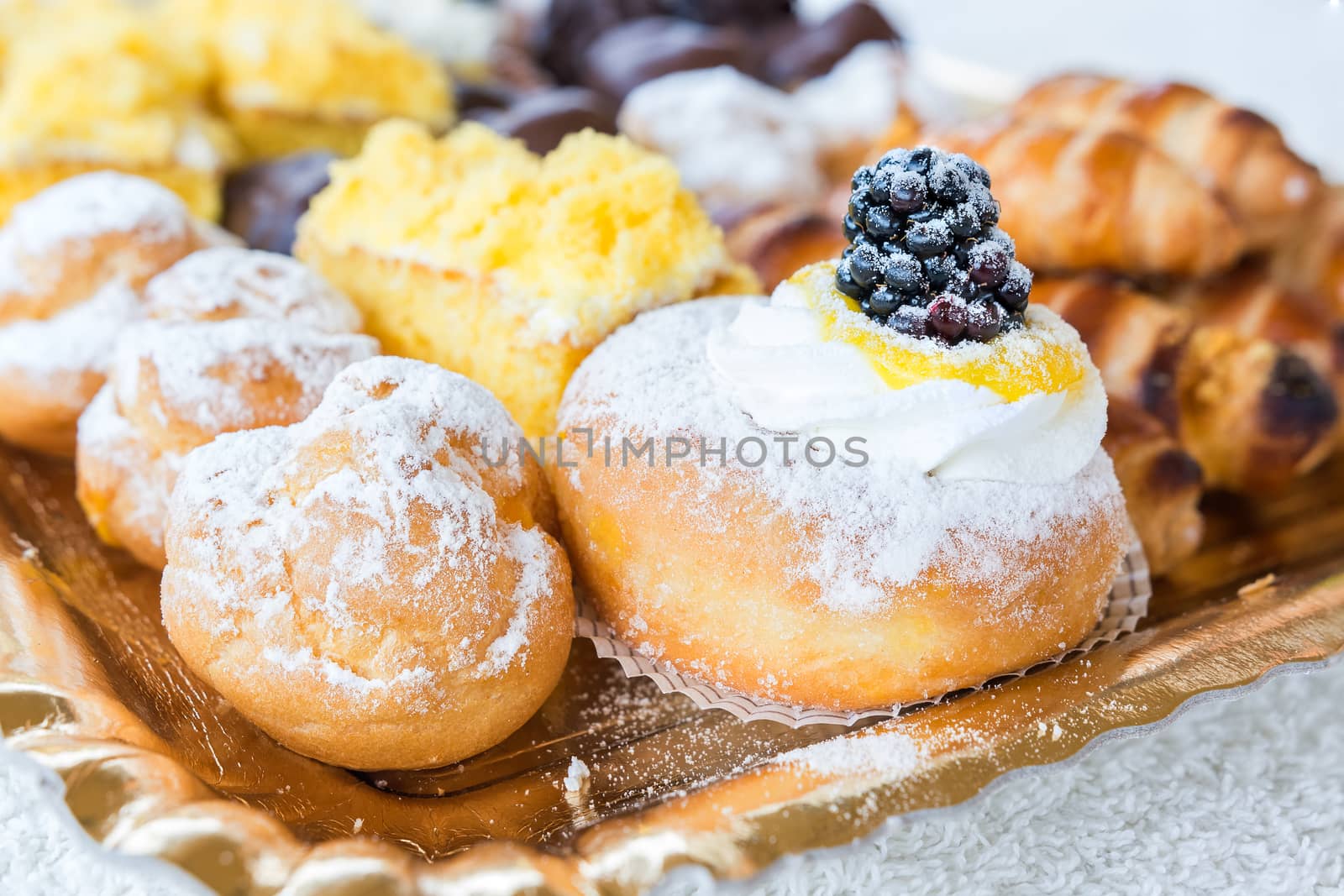 In the picture a tray of pastries typical Italian.