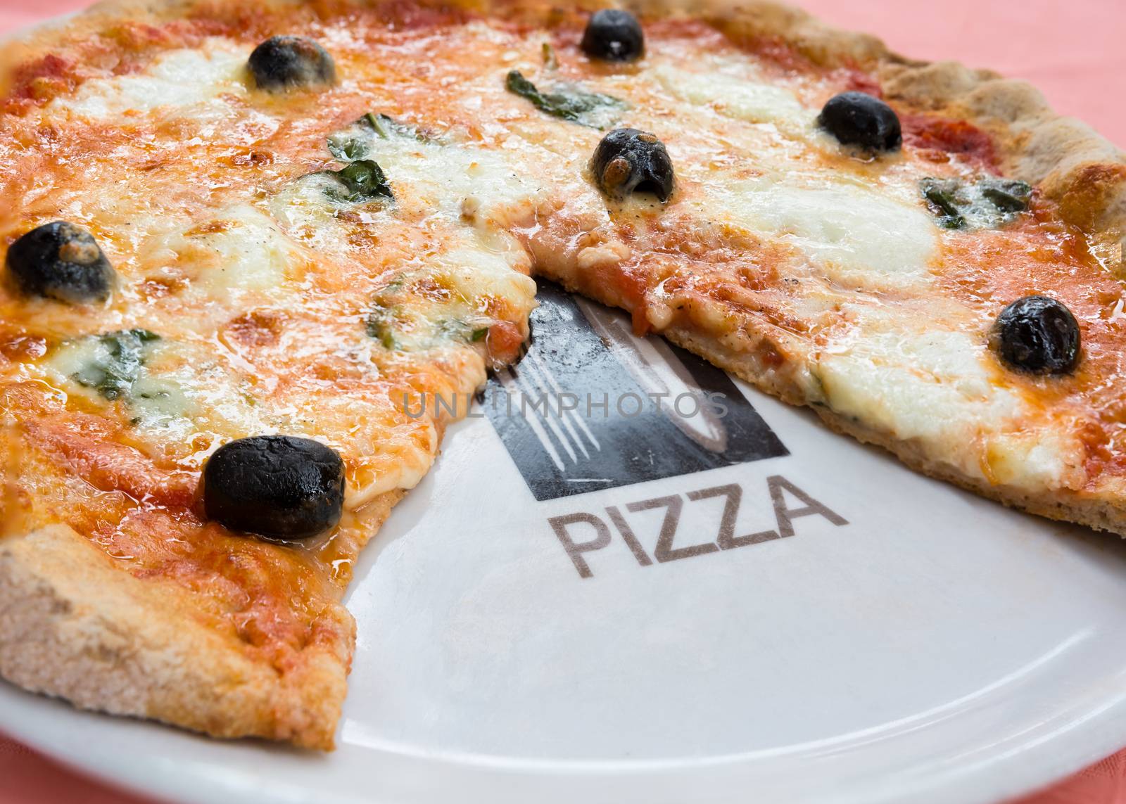 wheat pizza with olives and basil by Robertobinetti70