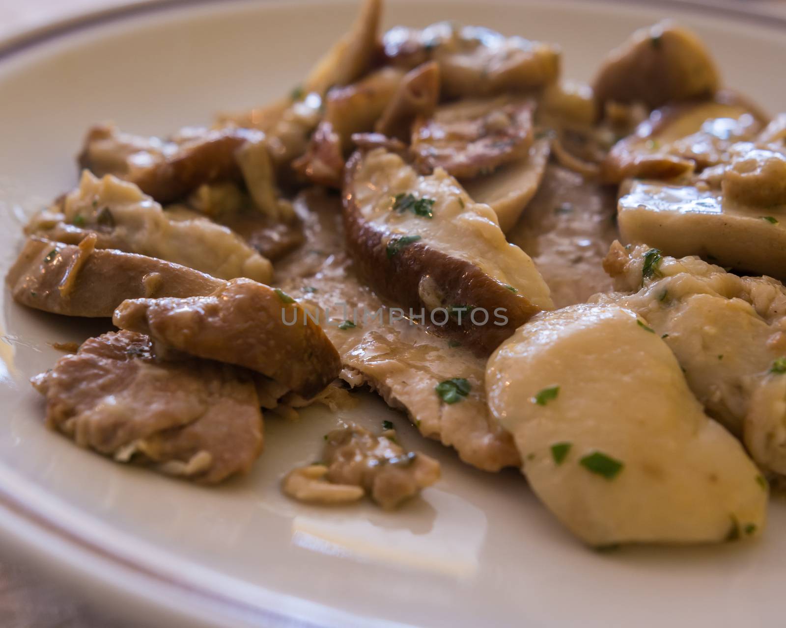 Veal cutlet with mushrooms porcini and cream.