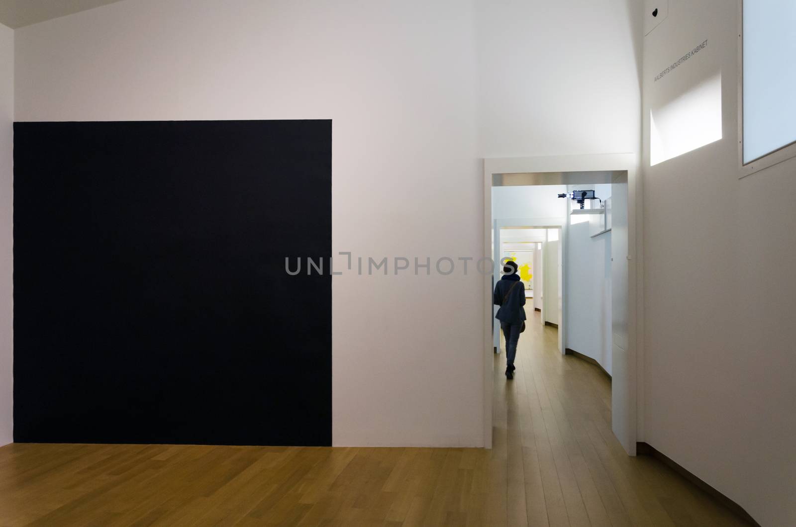 Amsterdam, Netherlands - May 6, 2015: People visit Stedelijk Musem in Amsterdam located in the museum park, Netherlands on May 6, 2015