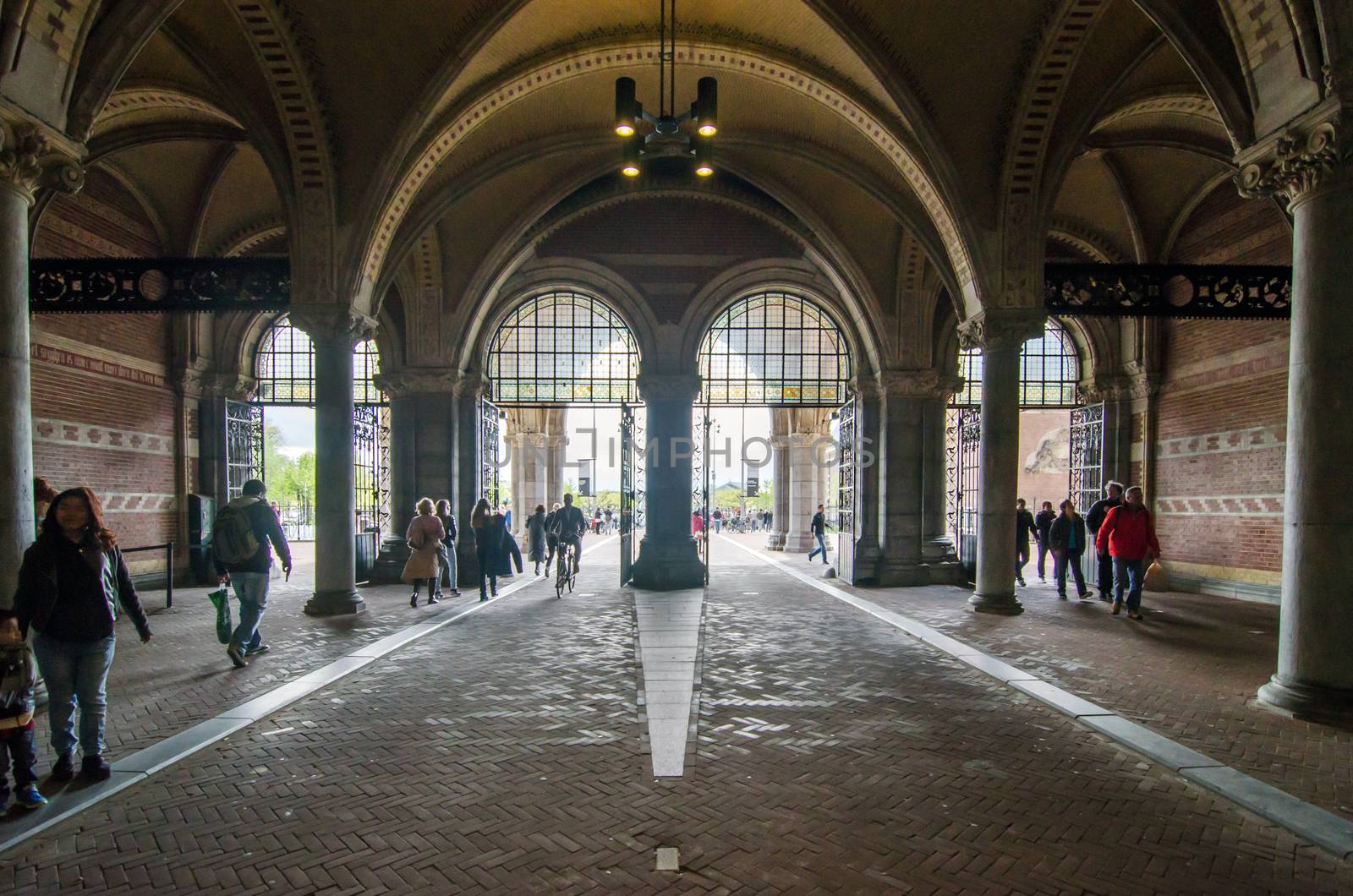 Amsterdam, Netherlands - May 6, 2015: People at main entrance of the Rijksmuseum passage on May 6, 2015. Rijksmuseum is a Netherlands national museum dedicated to arts and history in Amsterdam. 