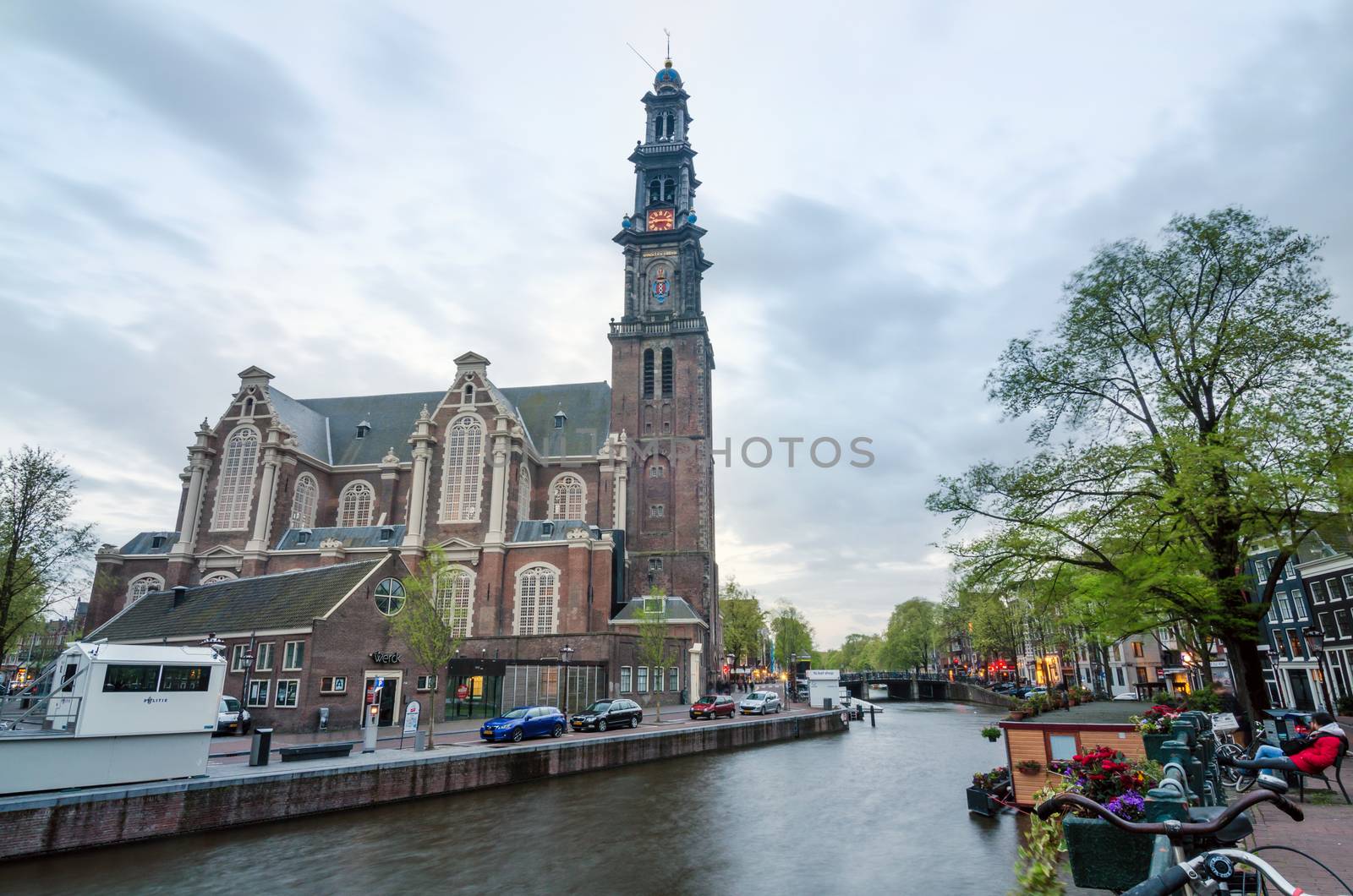 Amsterdam, Netherlands - May 6, 2015: People at Westerkerk (Western Church) a Dutch Protestant church in central Amsterdam in the Netherlands. on May 6, 2015.