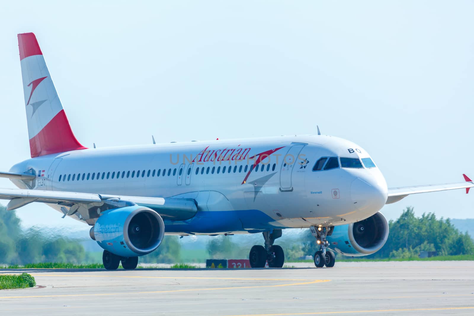 MOSCOW, RUSSIAN FEDERATION - MAY 26, 2015: Austrian Airbus 320 taxiing on the runway before take-off. Oficial spotting in Domodedovo airport (DME) on May 26, Moscow, Russian Federation