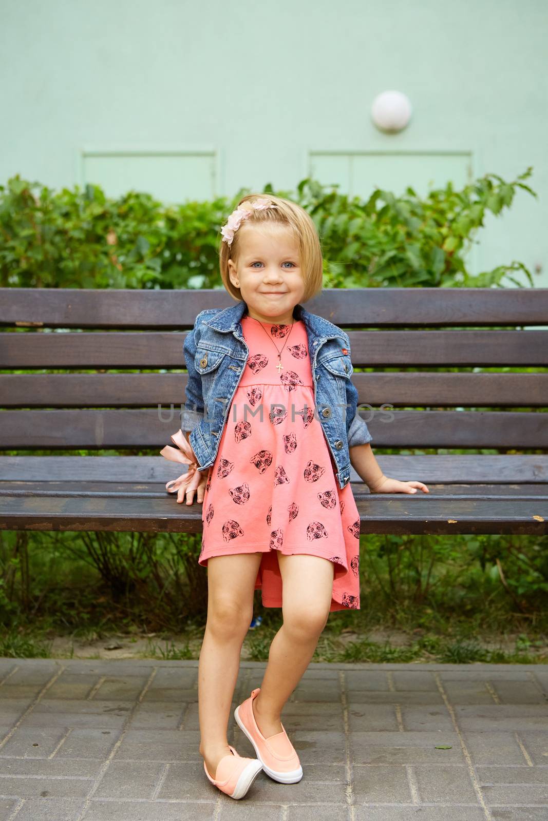 Portrait of funny little child, adorable blonde toddler girl  by sarymsakov