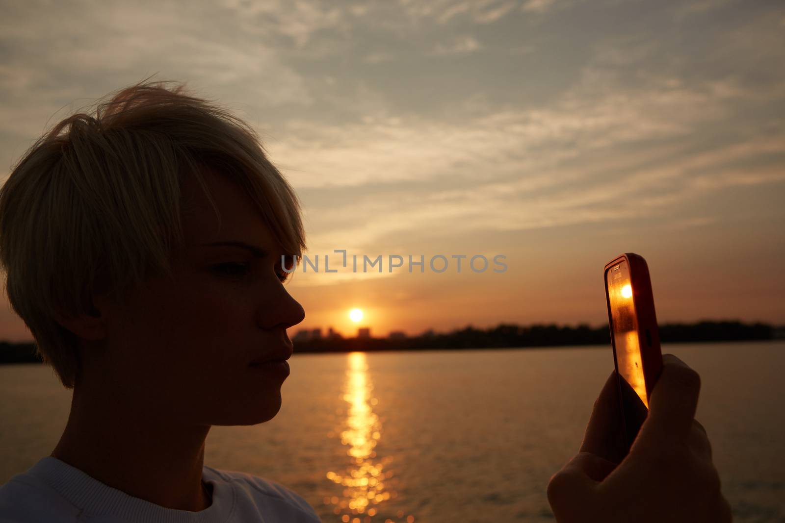 blonde woman makes selfy by sarymsakov