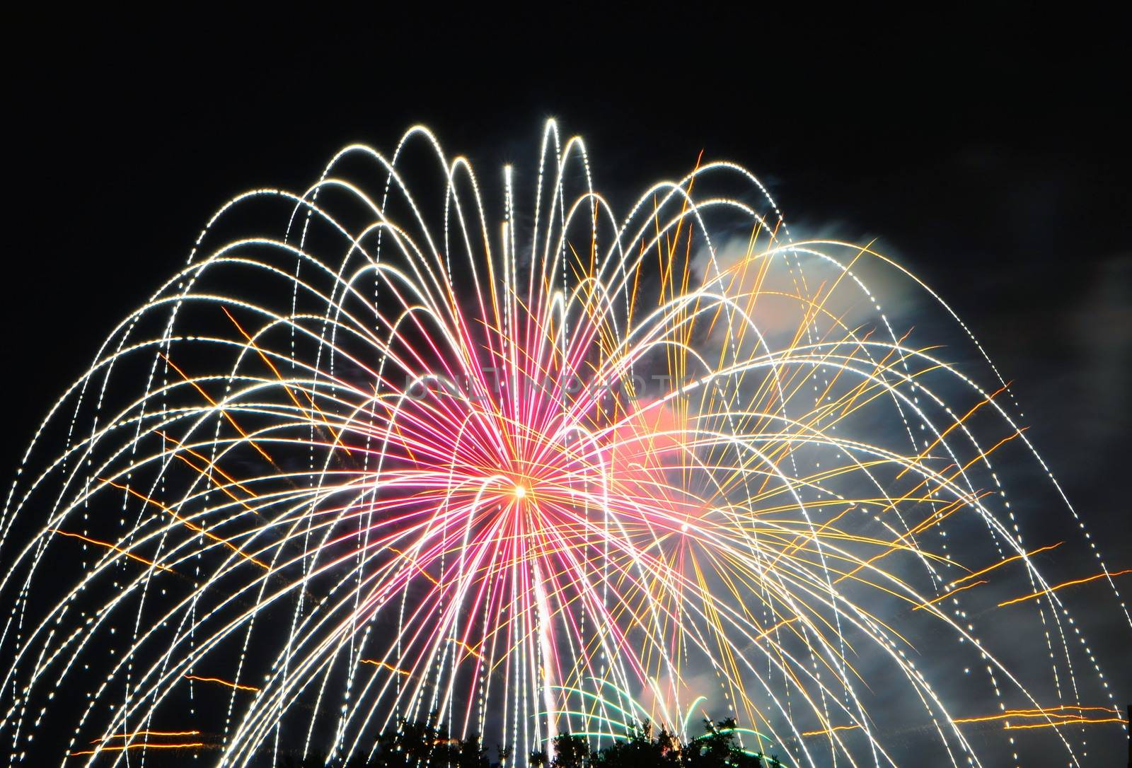 fireworks lighting the night sky in different colors