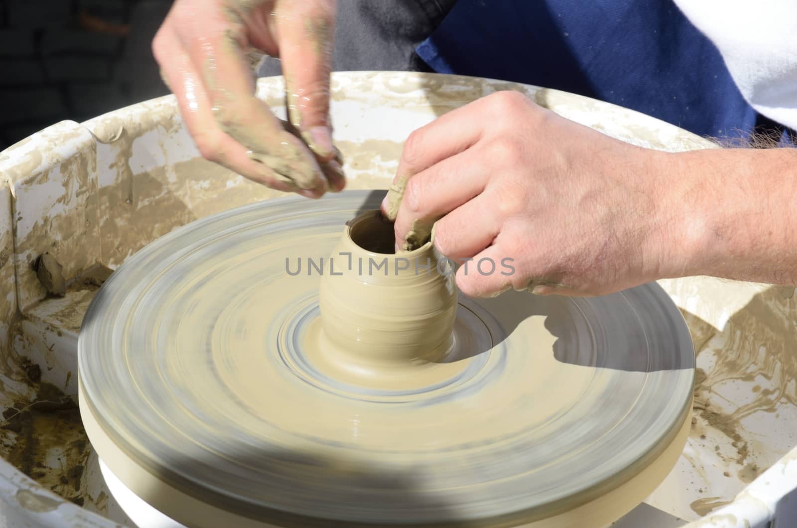 Pot being made on potting wheel