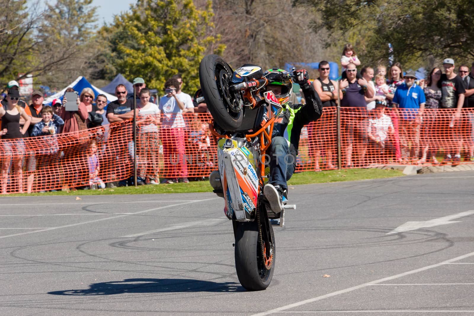 VICTORIA/AUSTRALIA - SEPTEMBER 2015: Stunt motorcycle rider performing at a local car show on the 13 September 2015 in Corowa.