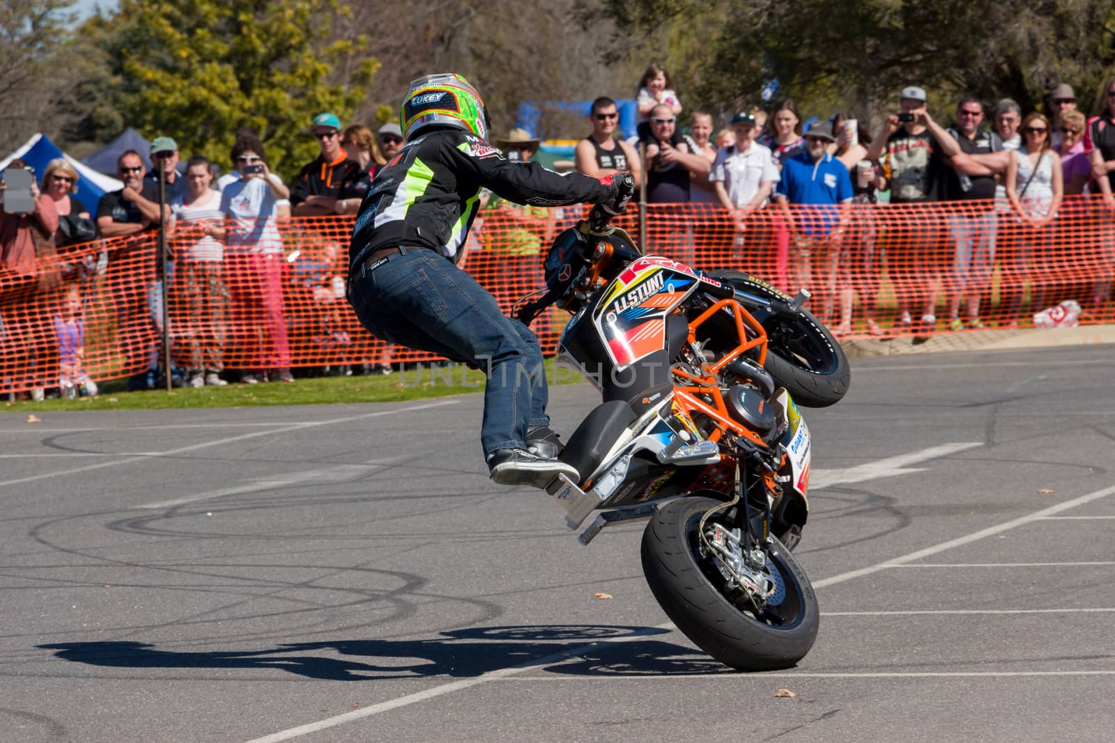 VICTORIA/AUSTRALIA - SEPTEMBER 2015: Stunt motorcycle rider performing at a local car show on the 13 September 2015 in Corowa.