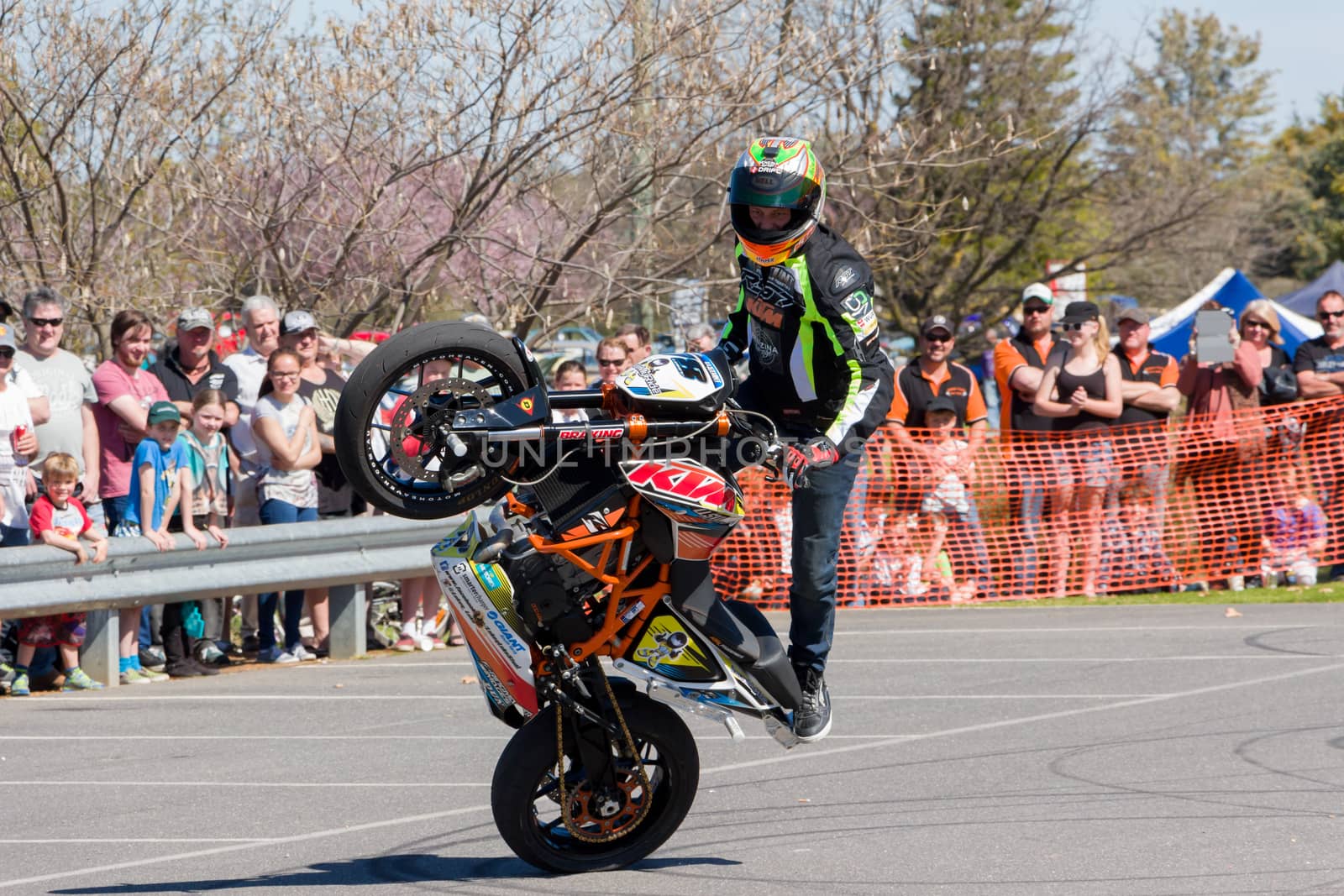 VICTORIA/AUSTRALIA - SEPTEMBER 2015: Stunt motorcycle rider performing at a local car show on the 13 September 2015 in Corowa.