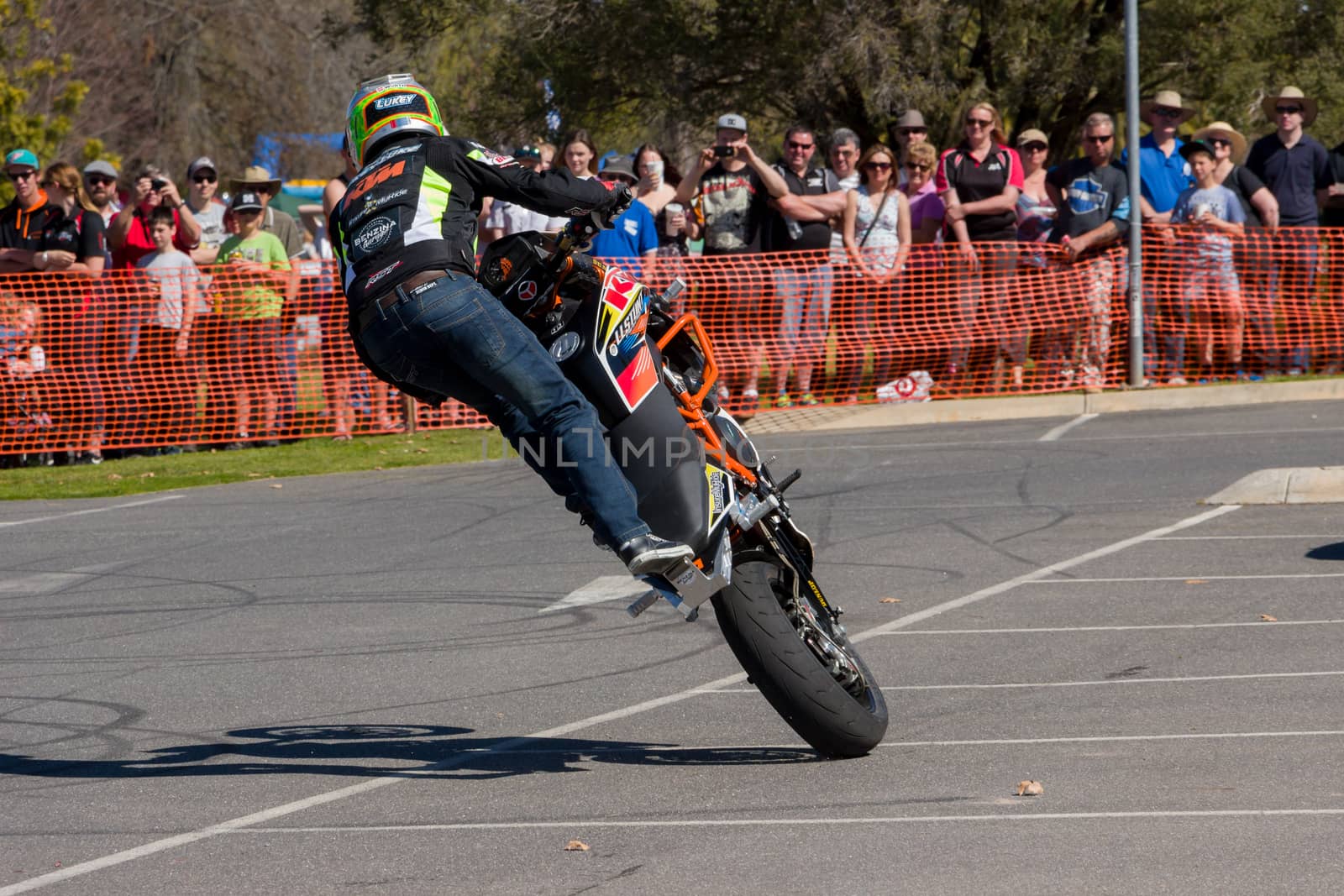 VICTORIA/AUSTRALIA - SEPTEMBER 2015: Stunt motorcycle rider performing at a local car show on the 13 September 2015 in Corowa.