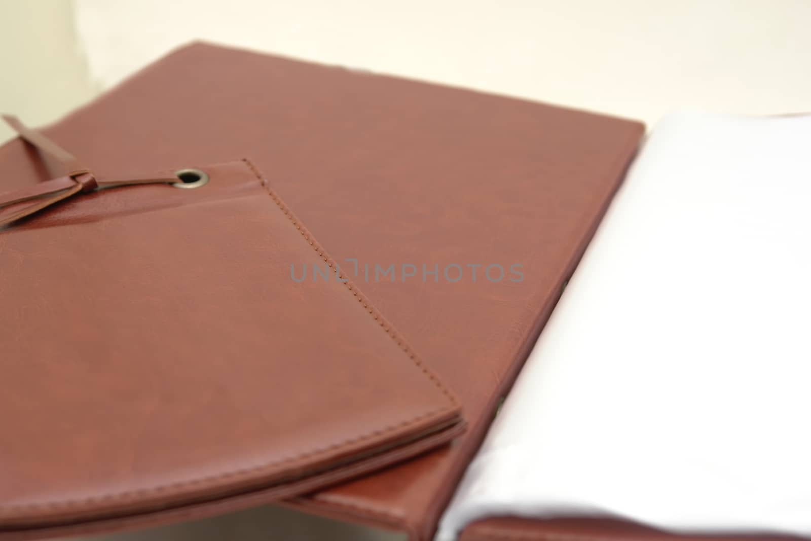 brown leather menu in a restaurant or cafe