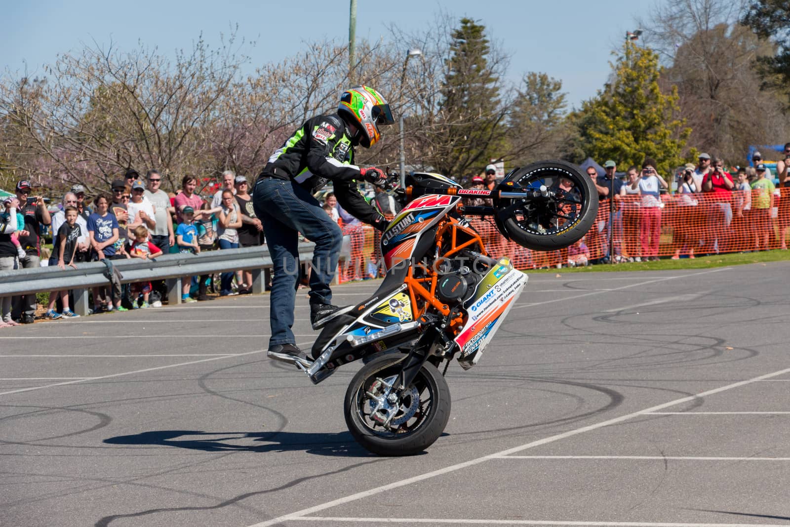 VICTORIA/AUSTRALIA - SEPTEMBER 2015: Stunt motorcycle rider performing at a local car show on the 13 September 2015 in Corowa.