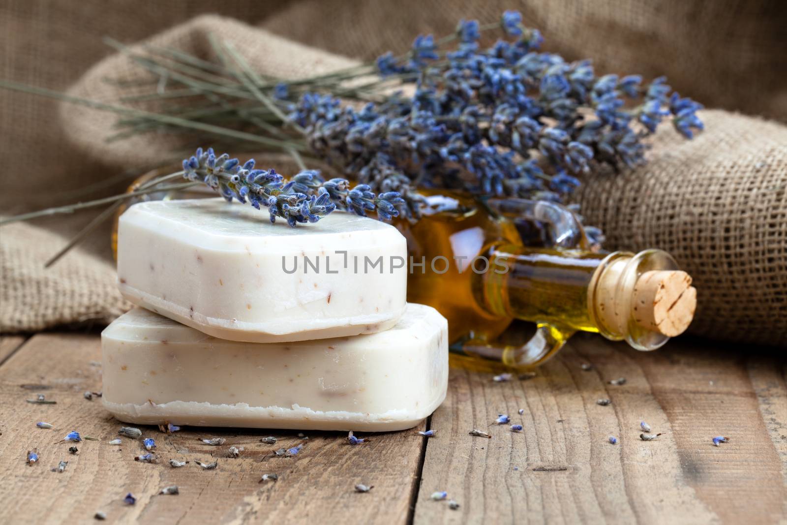 lavender handmade soap bars, on wooden background by motorolka