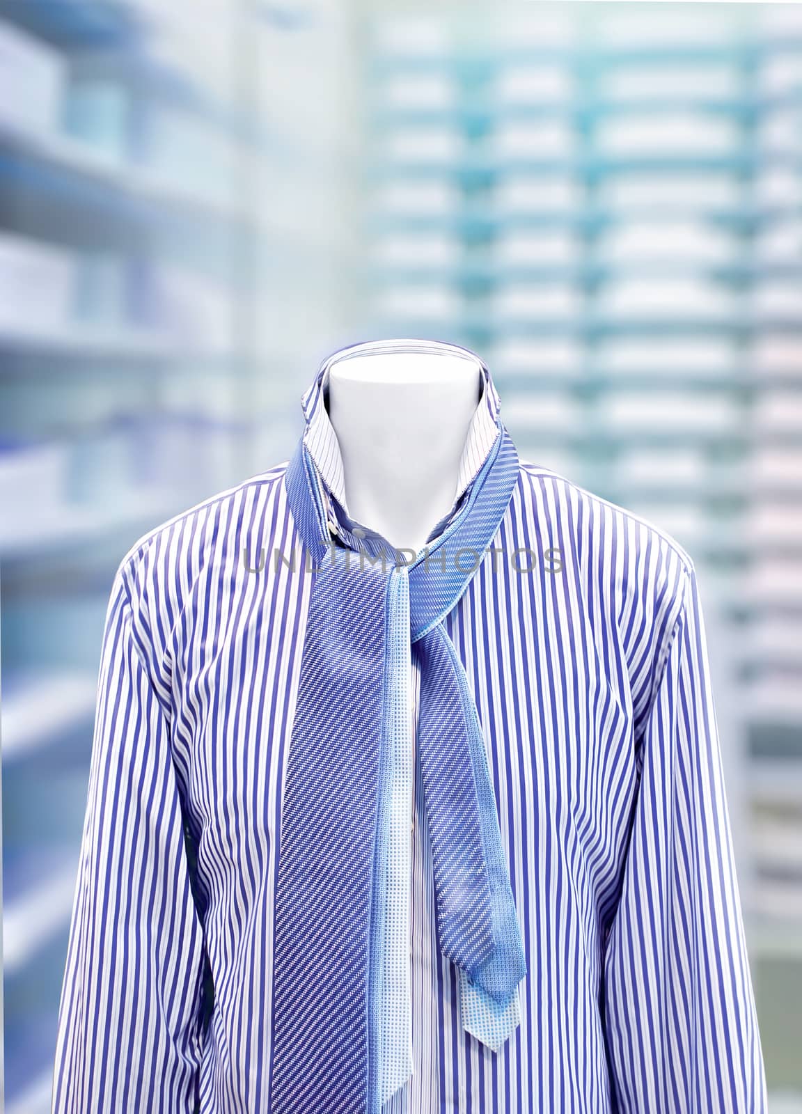 men's classic fashion (shirts and ties in store on mannequin)