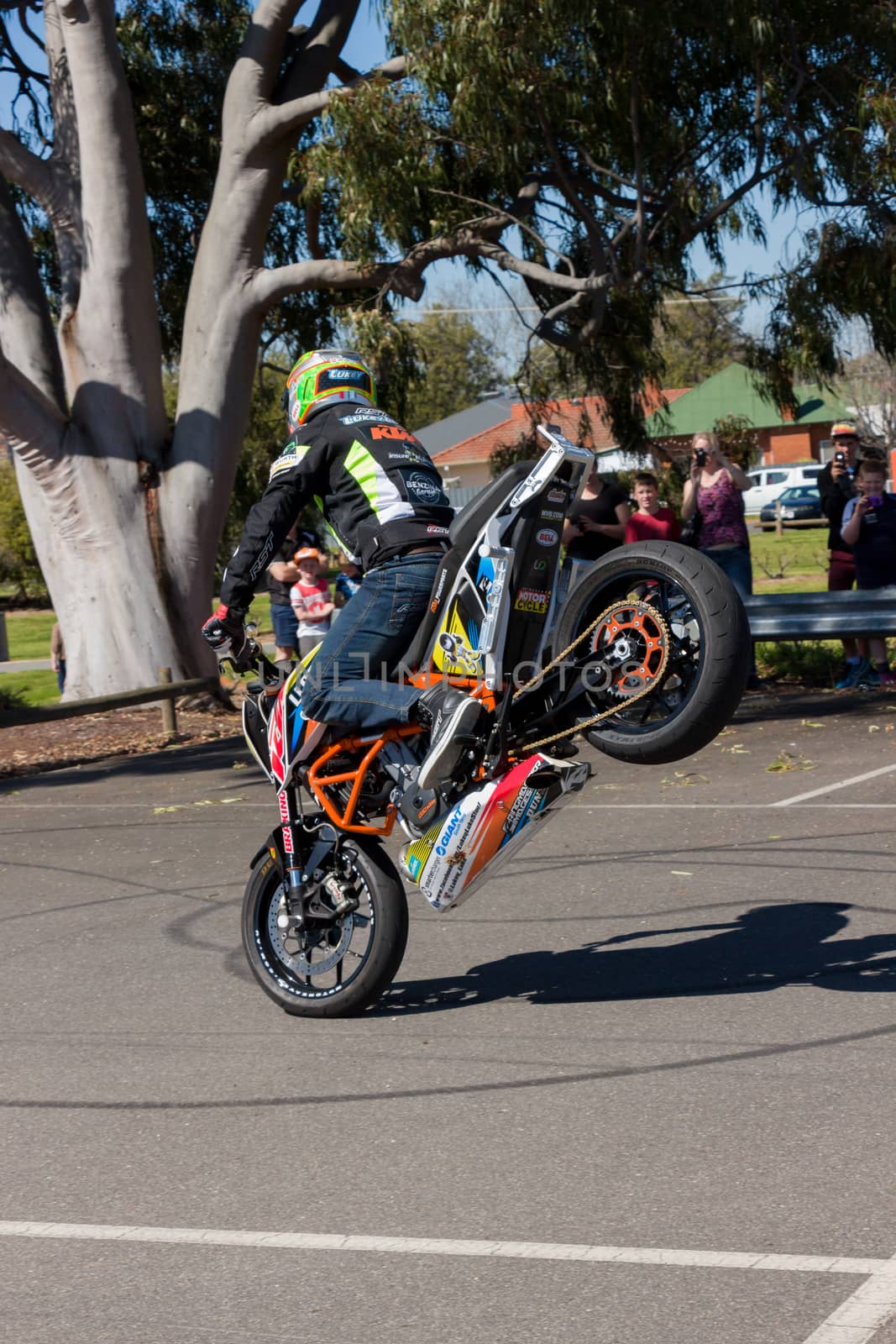 VICTORIA/AUSTRALIA - SEPTEMBER 2015: Stunt motorcycle rider performing at a local car show on the 13 September 2015 in Corowa.