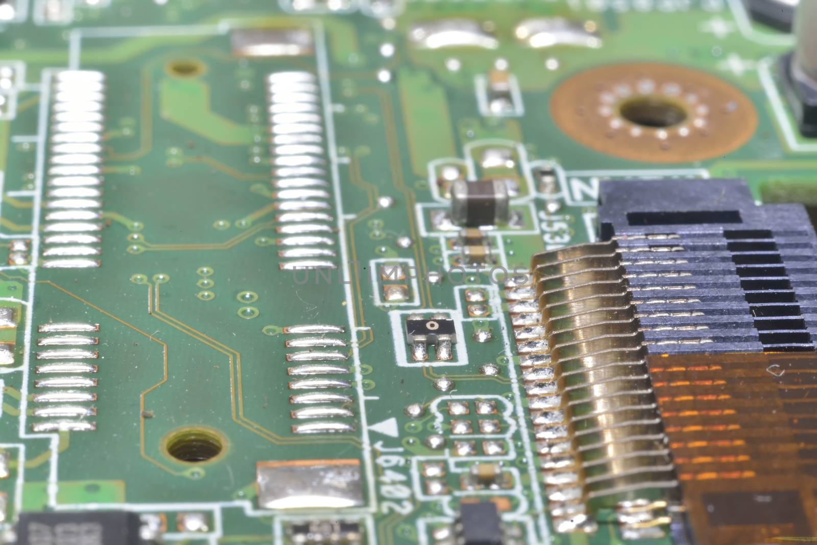 pins and wires on microcontroller (computer background)