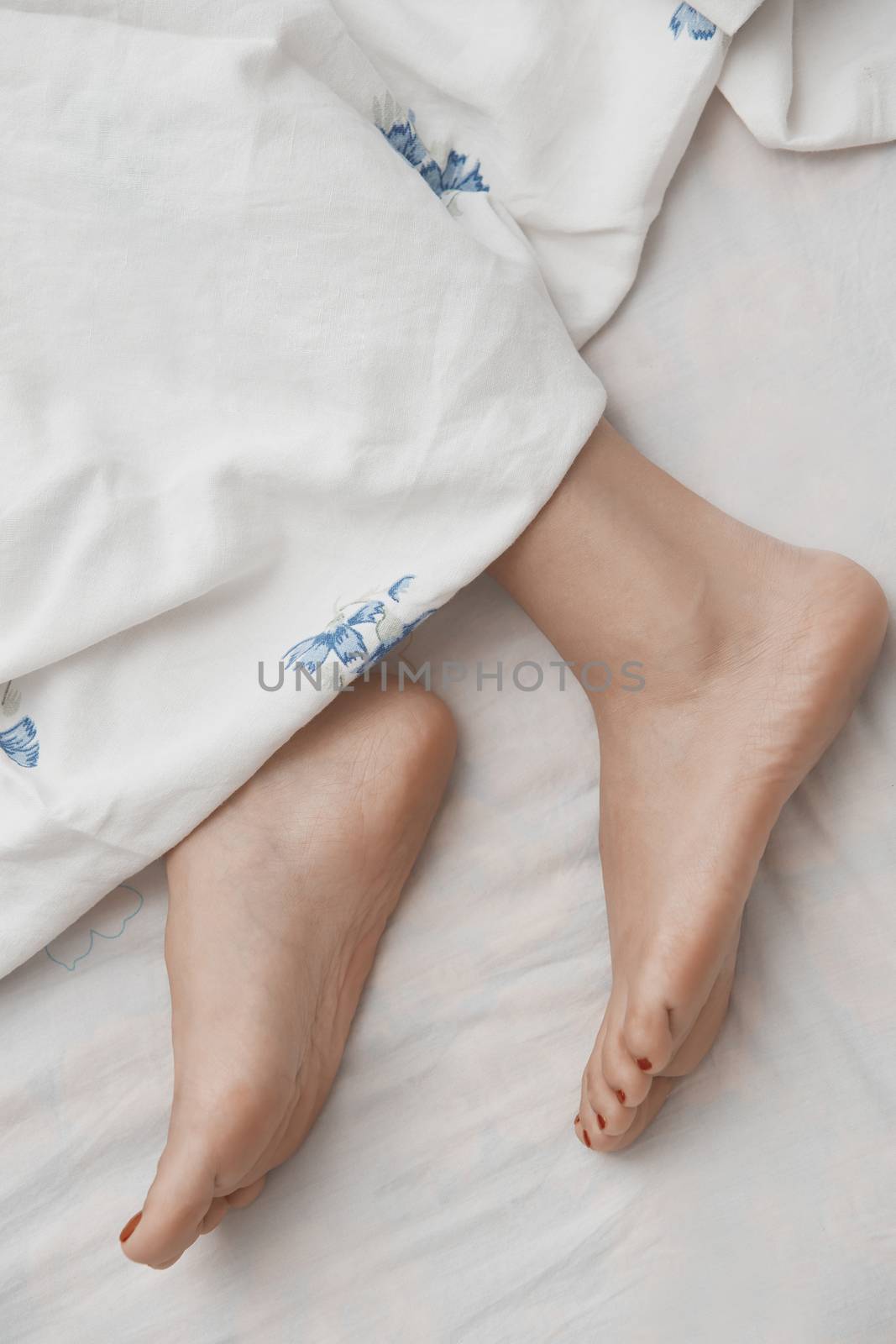 Feet of sleeping woman by Novic