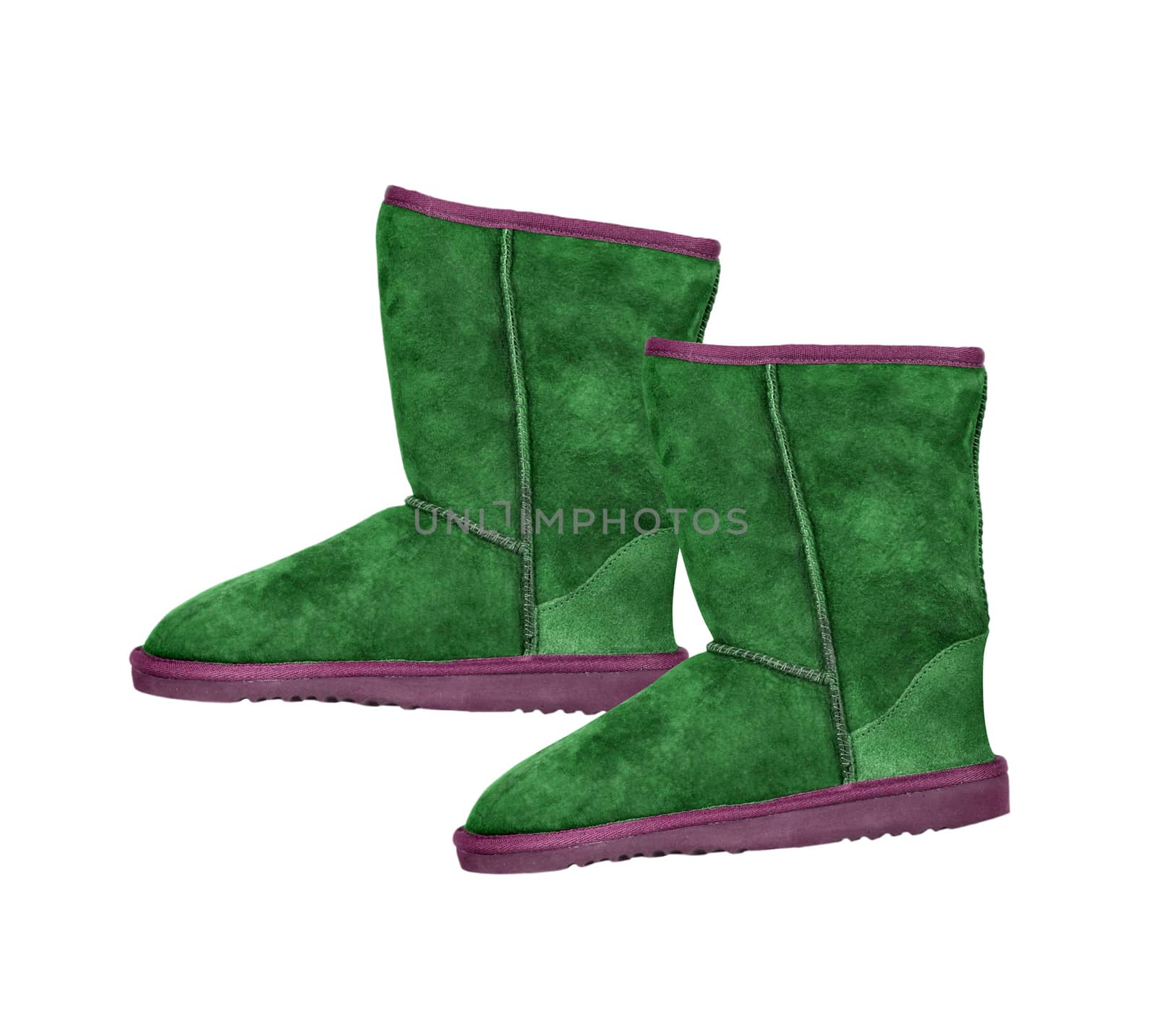 Fluffy woolly warm boots isolated over white