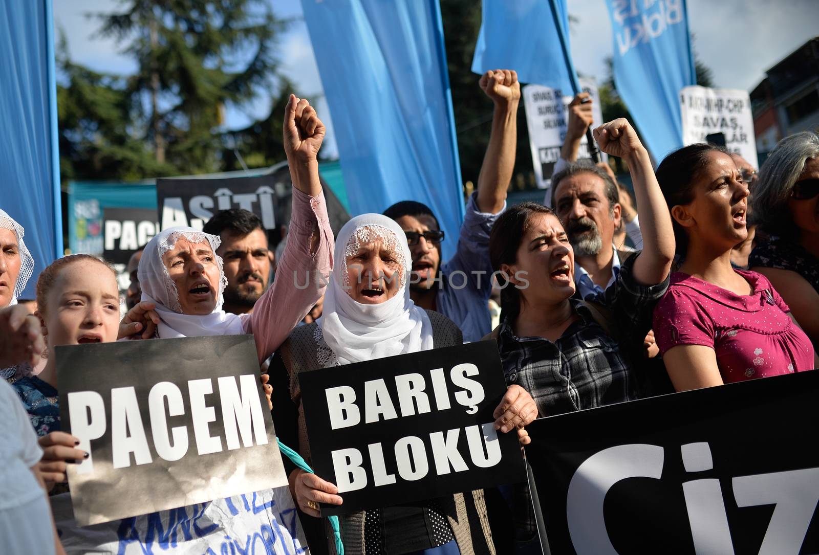 TURKEY, Istanbul: Kurdish community members and supporters hold a protest in Istanbul on Sept. 13, 2015 to call for an end to a recent government operation against Kurdish militants in Cizre. The predominantly Kurdish neighborhood that has been under heavy attack recently, resulting in many civilian deaths. 