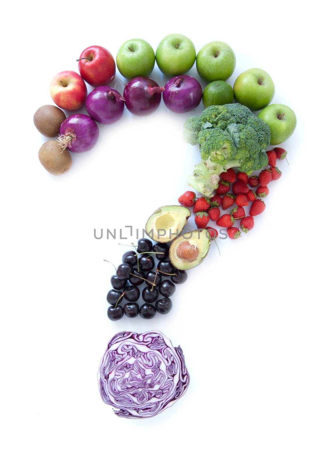 Question mark made from fruits and vegetables over a white background