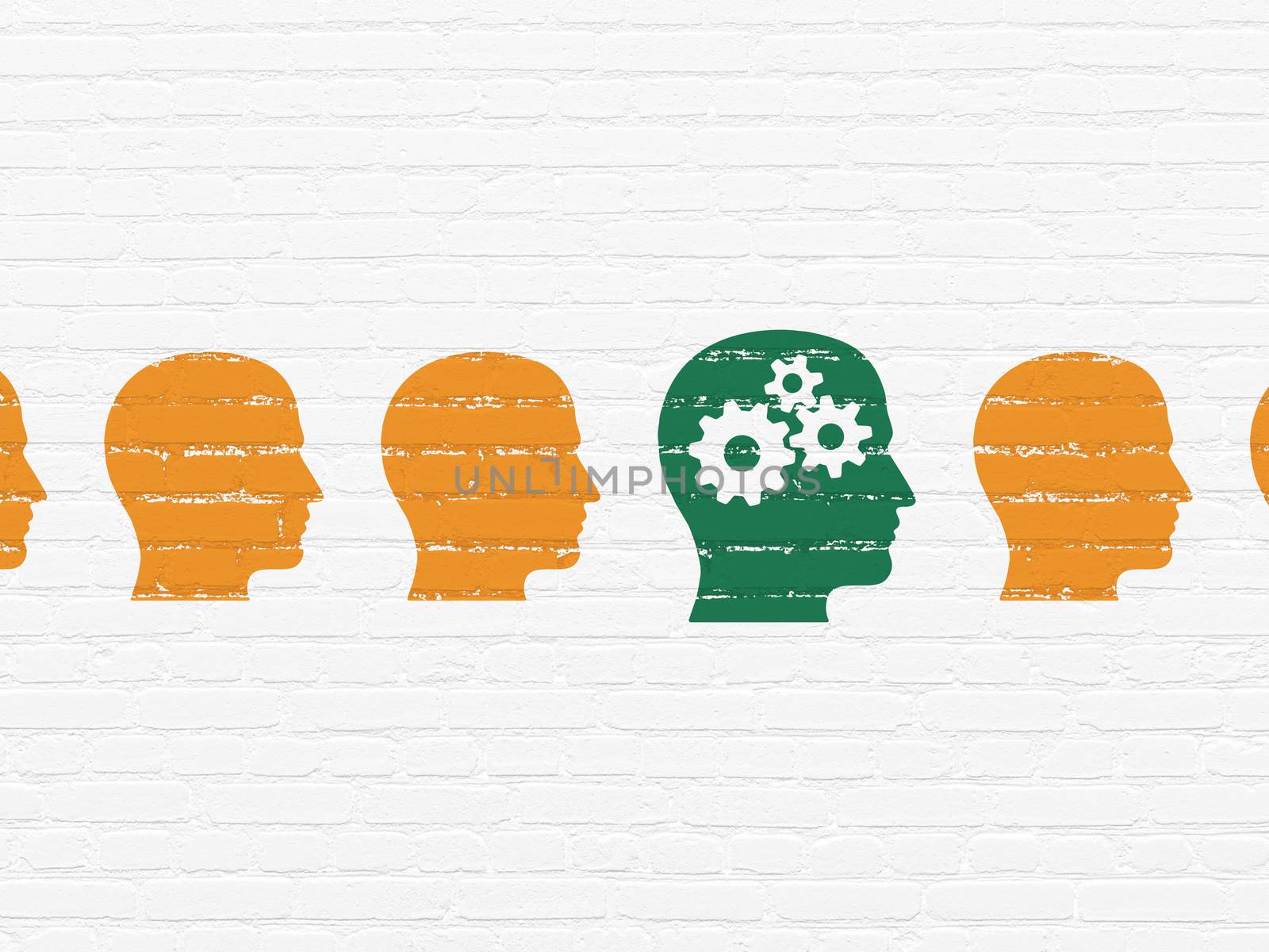 Learning concept: head with gears icon on wall background by maxkabakov