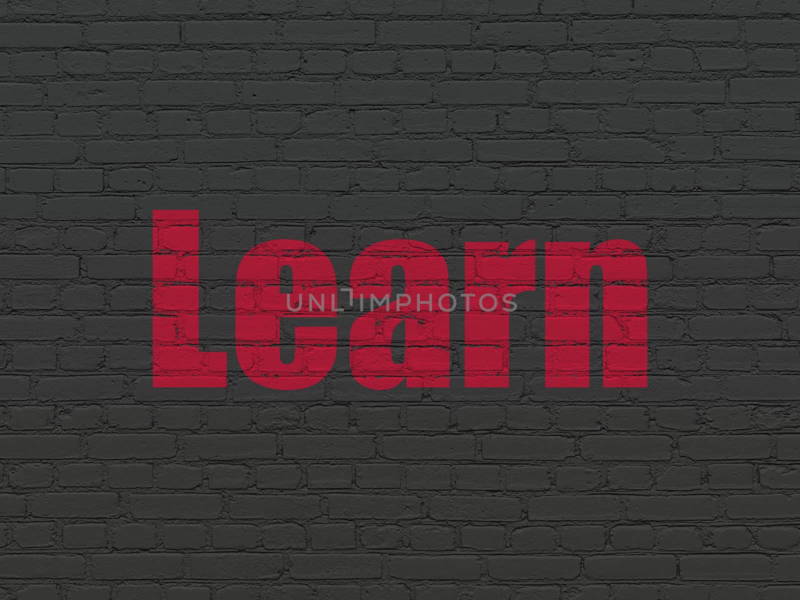 Education concept: Painted red text Learn on Black Brick wall background