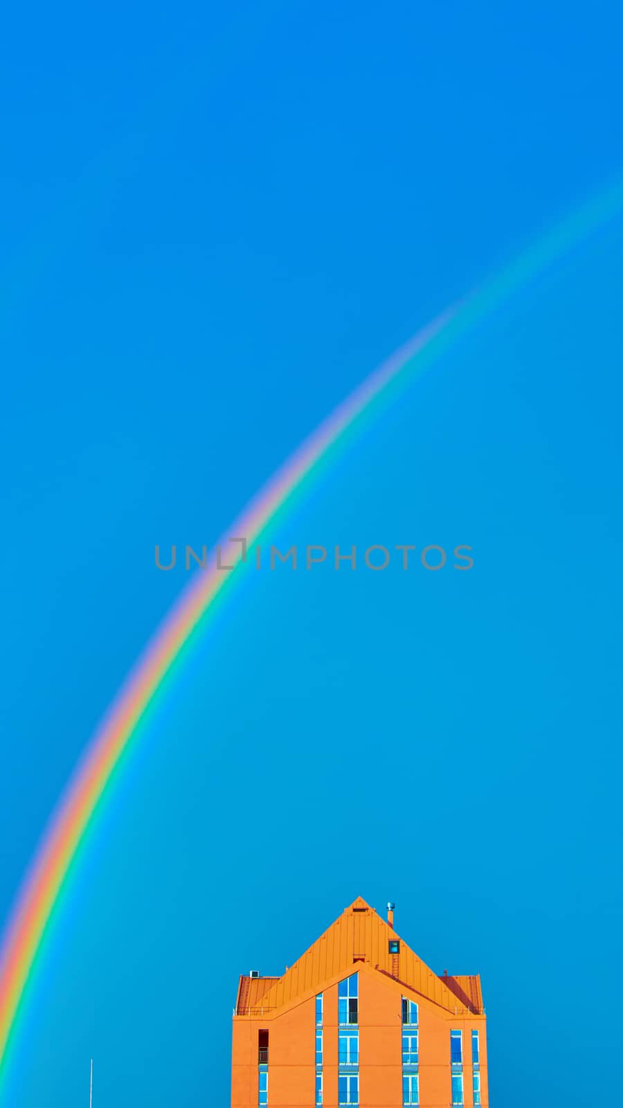 Double rainbow over bright colored houses. Kiev city