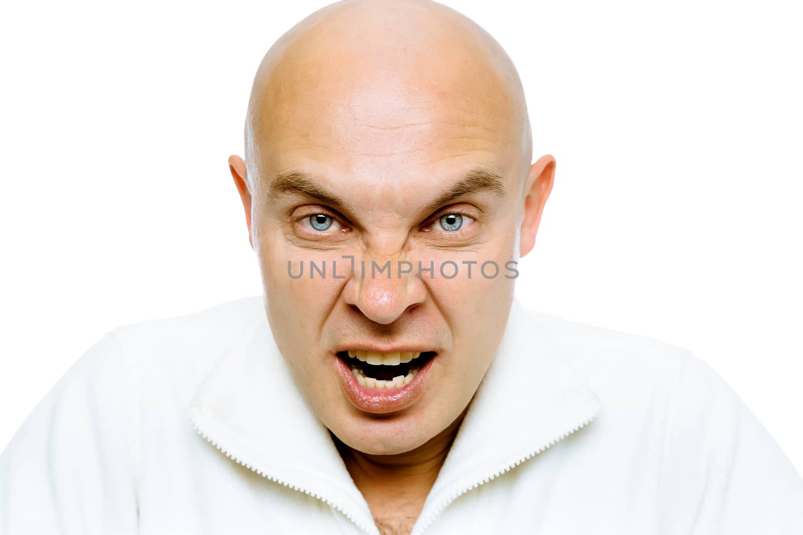 Bald man screams into the camera. Close-up. Isolated on white