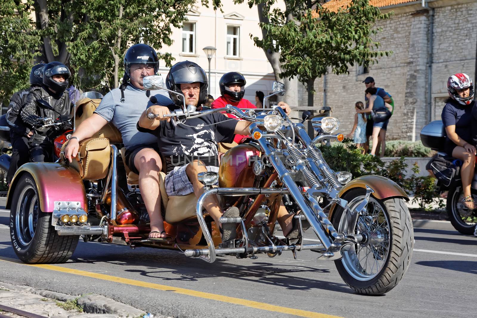 PULA, CROATIA - AUG 29: Unidentified participants in the annual parade at the Croatia Bike Week on August 29, 2015 in Pula, Croatia.