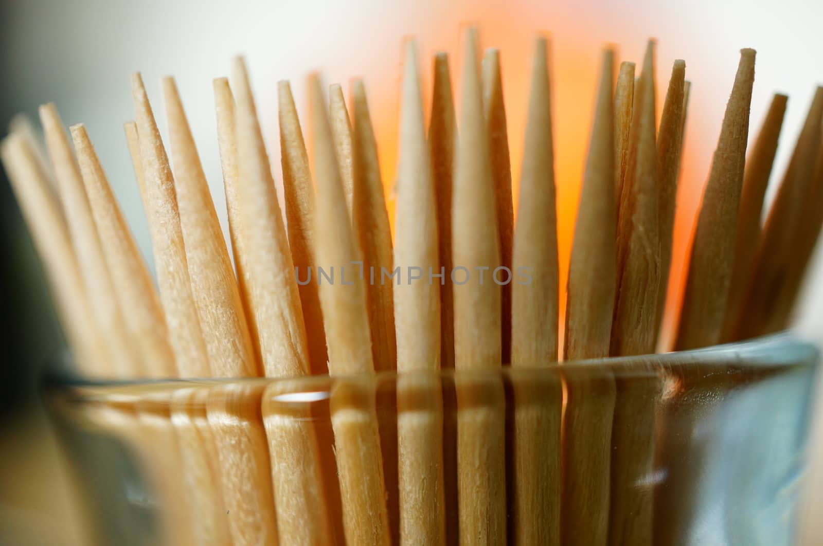 Group of wooden toothpicks in a glass