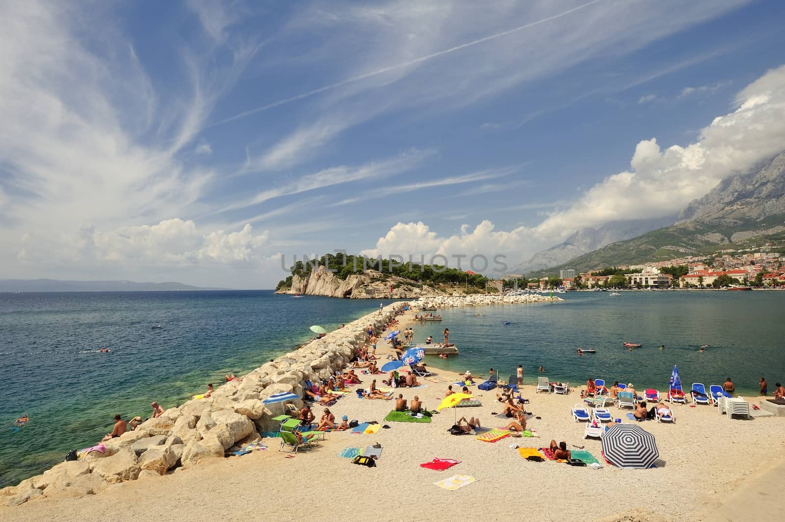 Makarska, Croatia - August 19, 2014: A busy beach in Makarska.