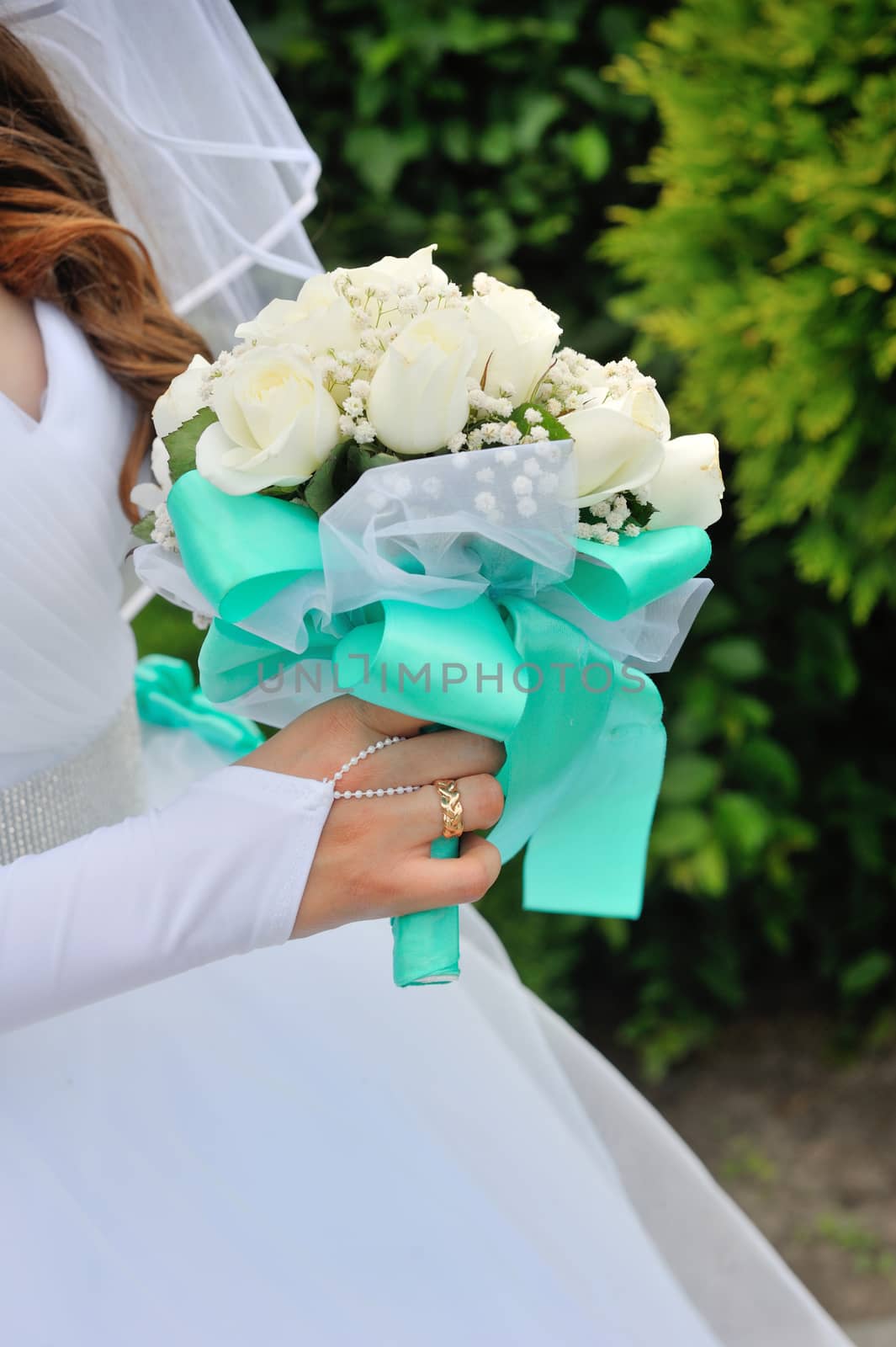Bride Holding Bouquet of White Roses by timonko