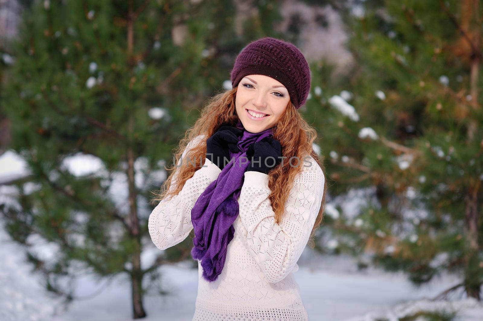 pretty smiling woman portrait outdoor in winter 