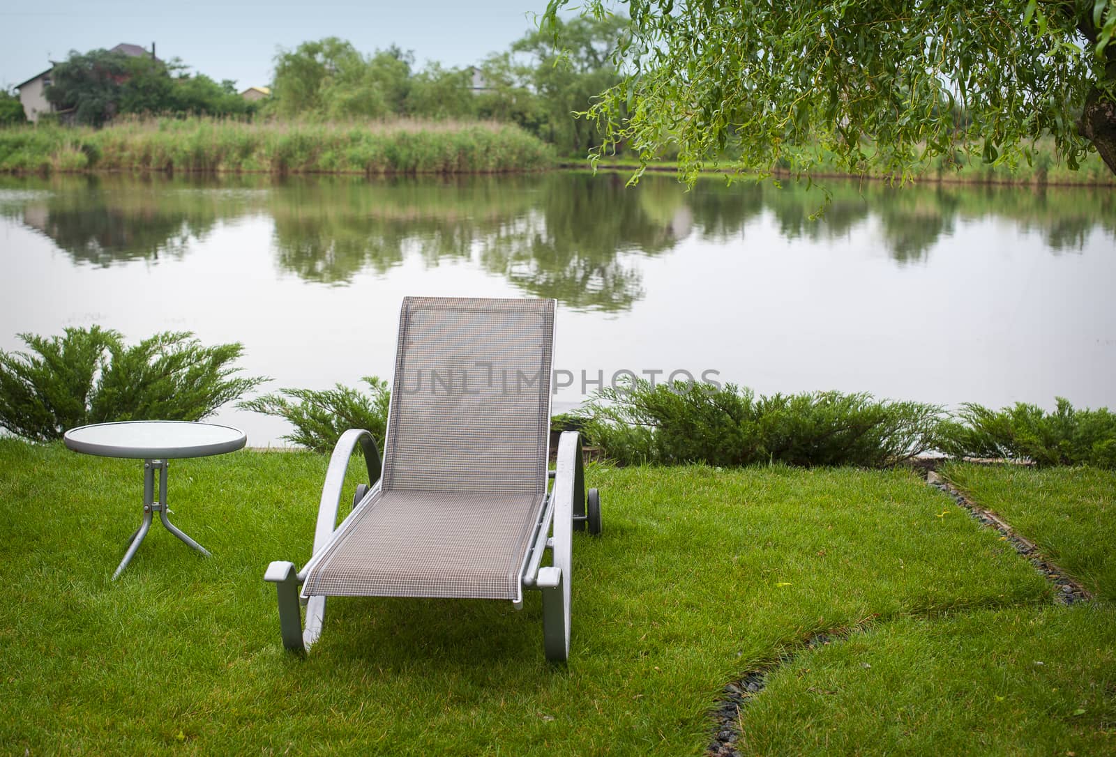 Sun lounger on the lake