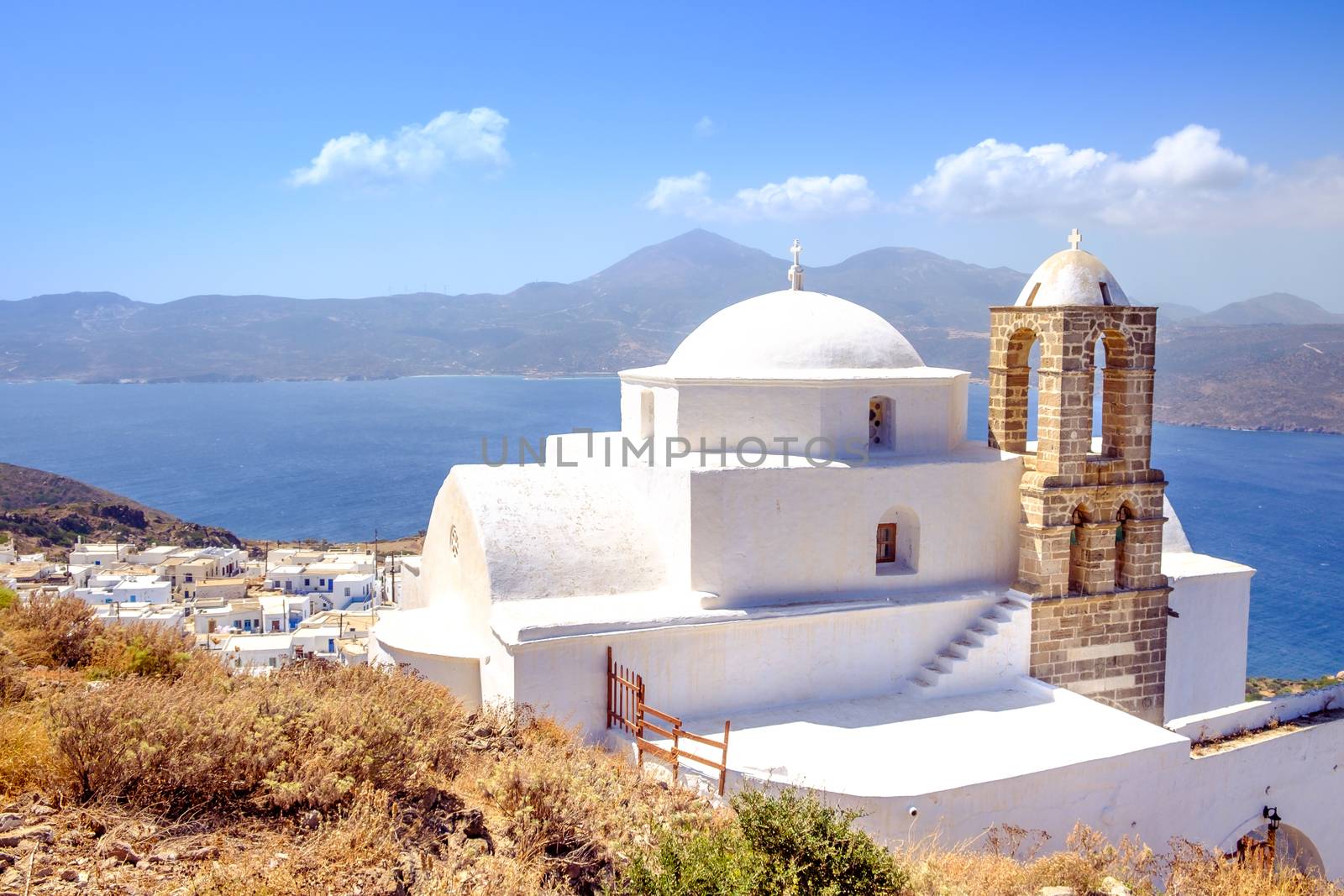Scenic view of traditional greek cycladic church and sea, Plaka village, Milos island, Greece