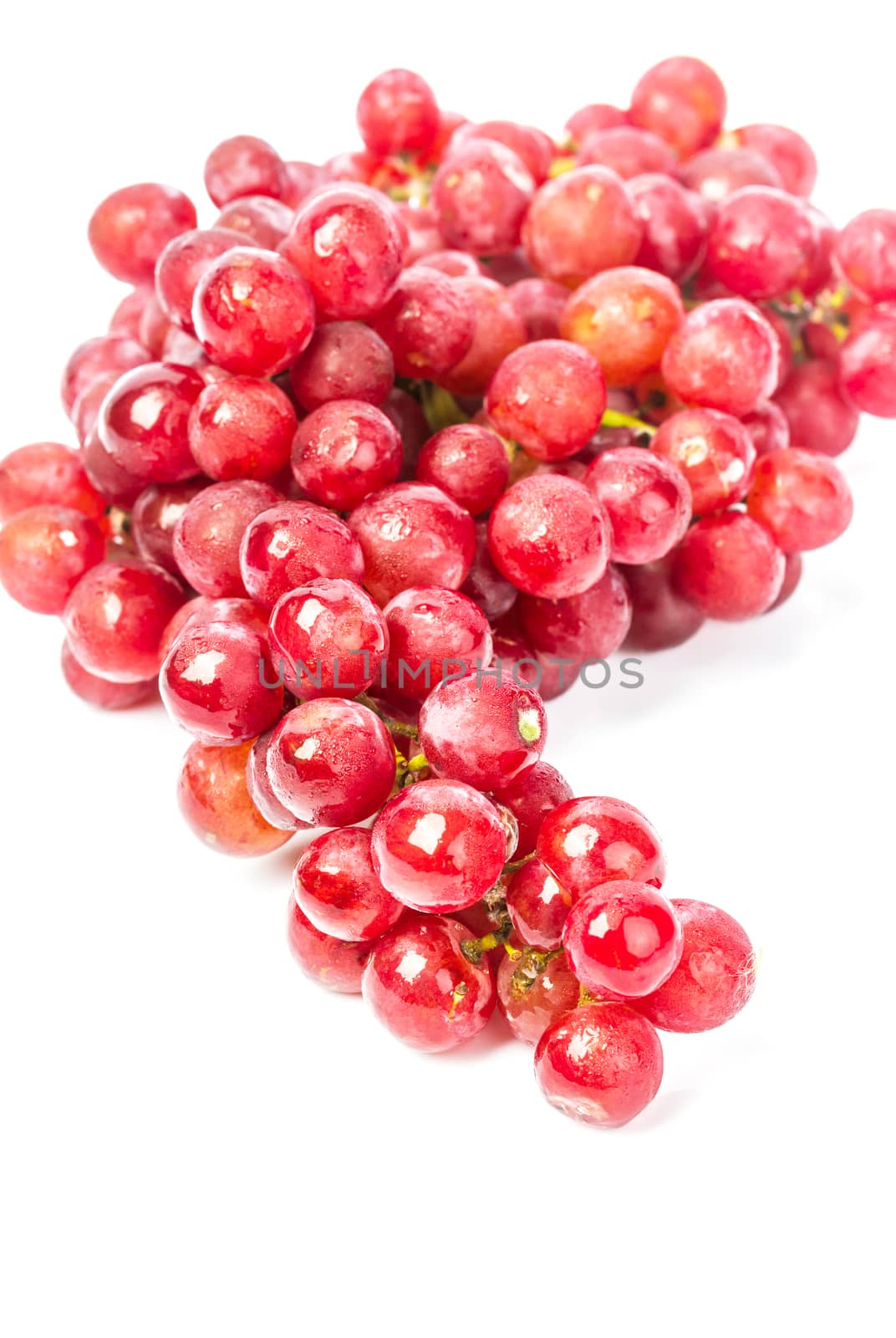 fresh bunch of red soak grape on white background
