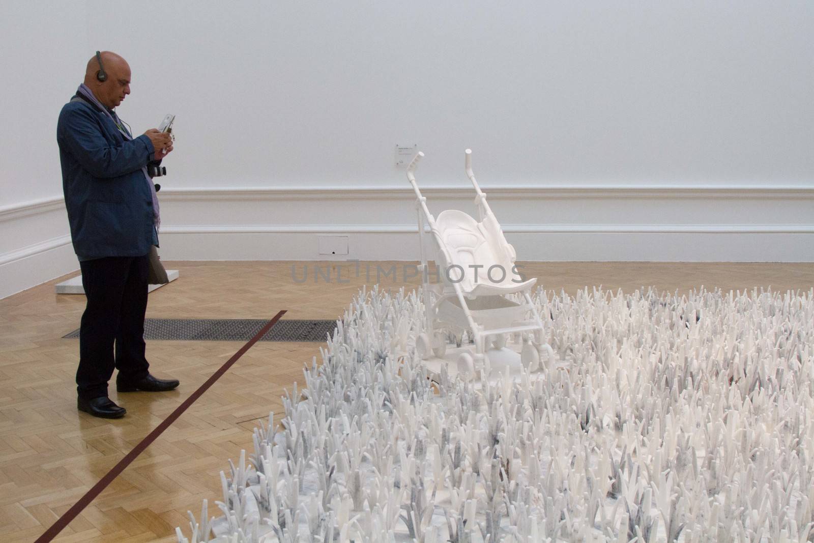 UK, London: Marble lawn by Chinese artist Ai Weiwei, in his new exhibition at the Royal Academy in London, on September 15, 2015. 	The show opens to the public on September 19 and has been hailed by critics as his best ever exhbition. Works include a six-part diorama called 'Sacred' depicting his arrest, painted vases, and a security camera made from marble.