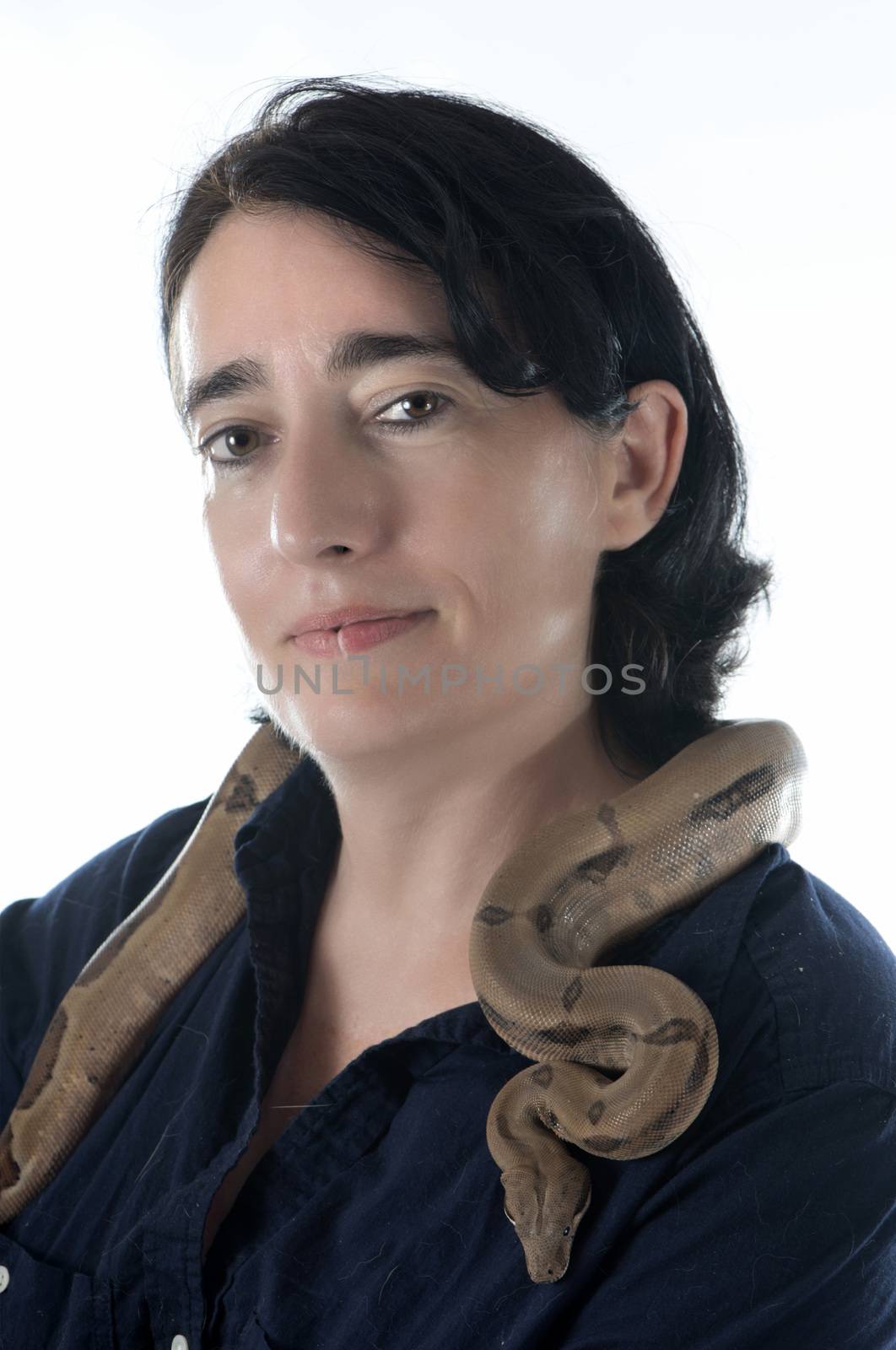 woman and snake in front of white background
