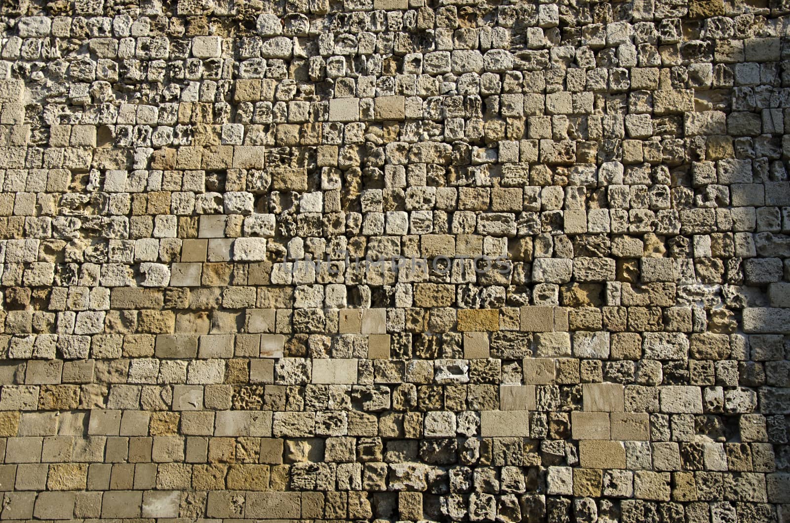 Antique fort wall made of stones in Greece