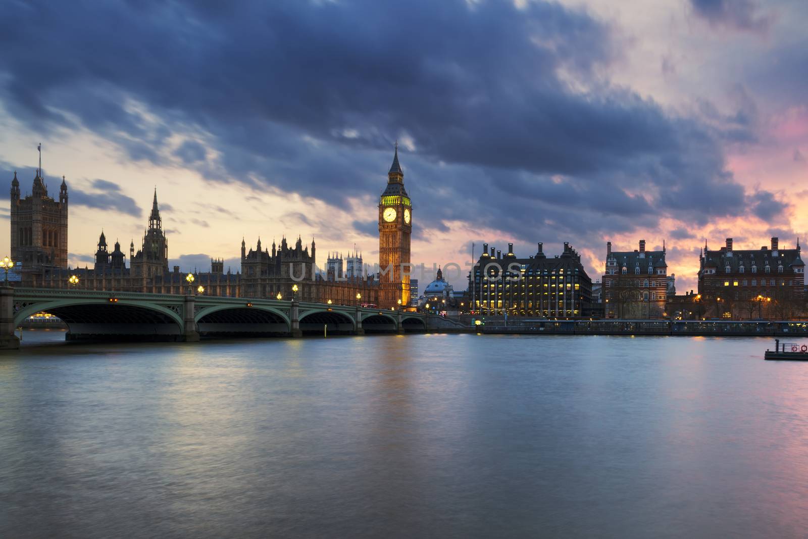 Big Ben clock tower in London at sunset by vwalakte