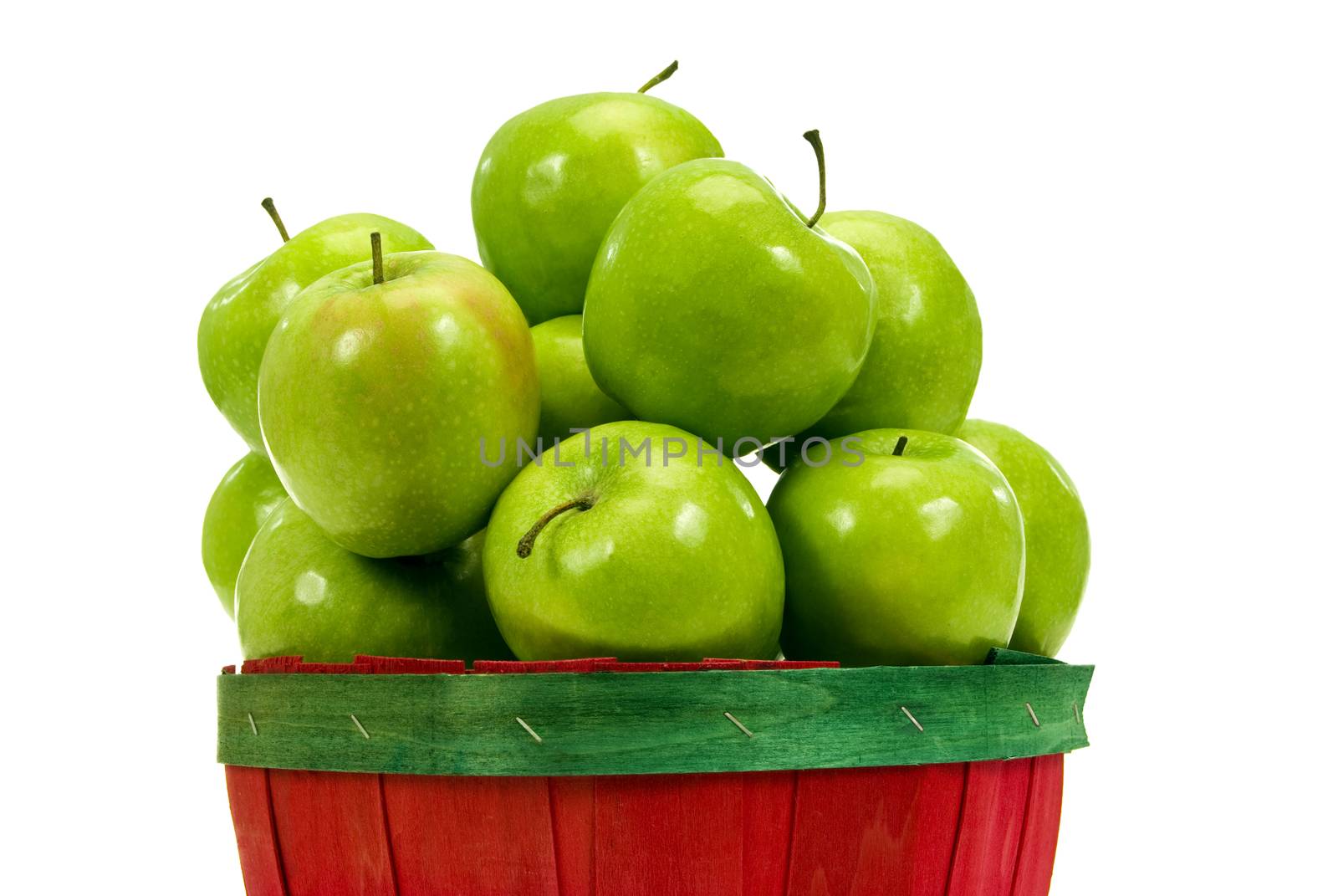 Close up shot of a little 'mountain' of green apples.  On white background