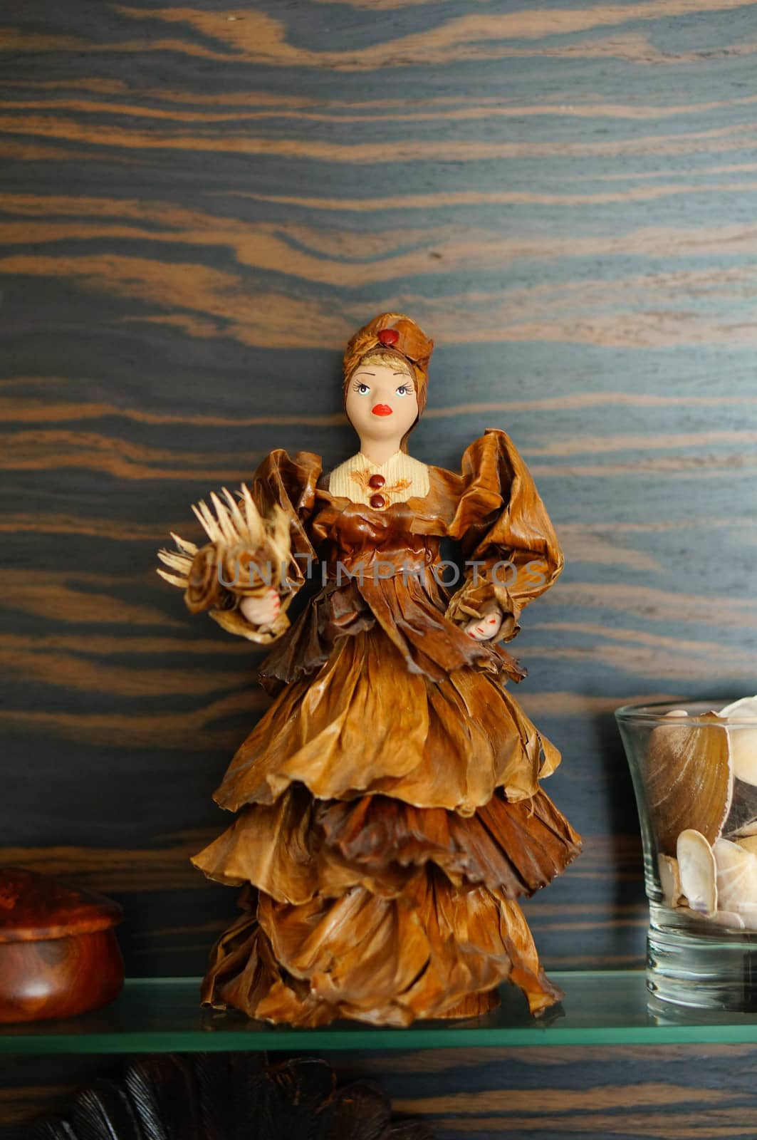 Spanish woman figure on glass shelf