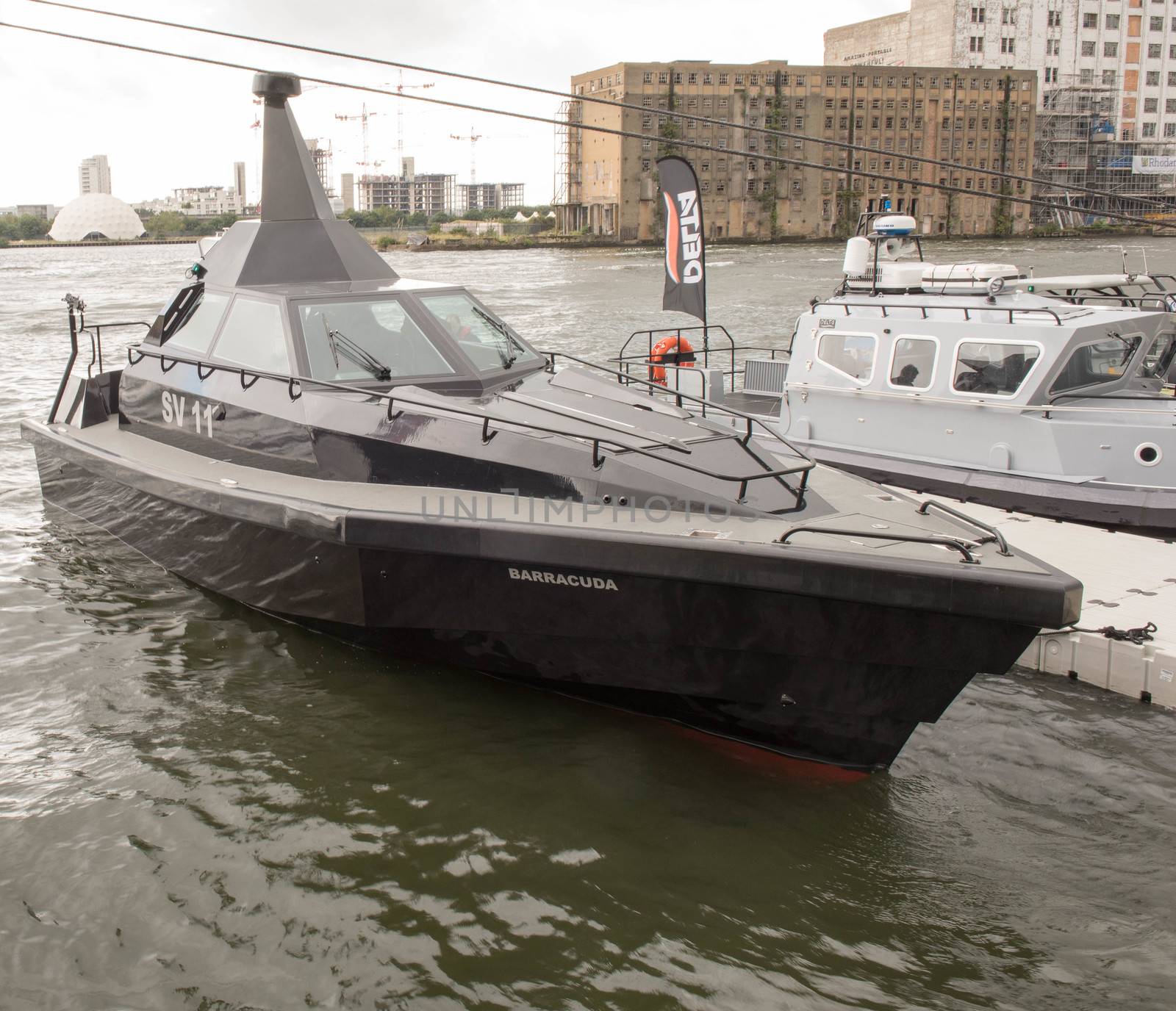 UNITED KINGDOM, London: Patrol craft	The Defence and Security International Exhibition (DSEI) began in London on September 15, 2015 despite a week of direct action protests by peace campaigners.  	The arms fair has seen over 30,000 people descend on London to see the 1,500 exhibitors who are displaying weapons of war from pistols and rifles up to tanks, assault helicopters and warships.  	Protesters attempted to block the main road into the exhibition, claiming that such an event strengthened the UK's ties to human rights abuses. 